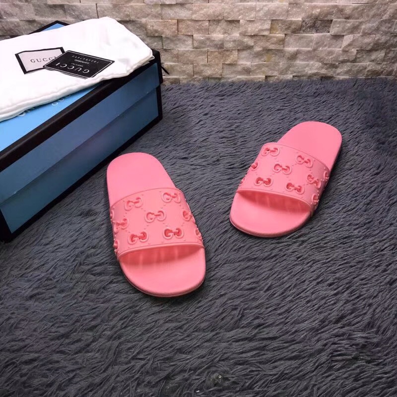 Gucci Rubber GG Slide Sandal In Pink - FashionPlug