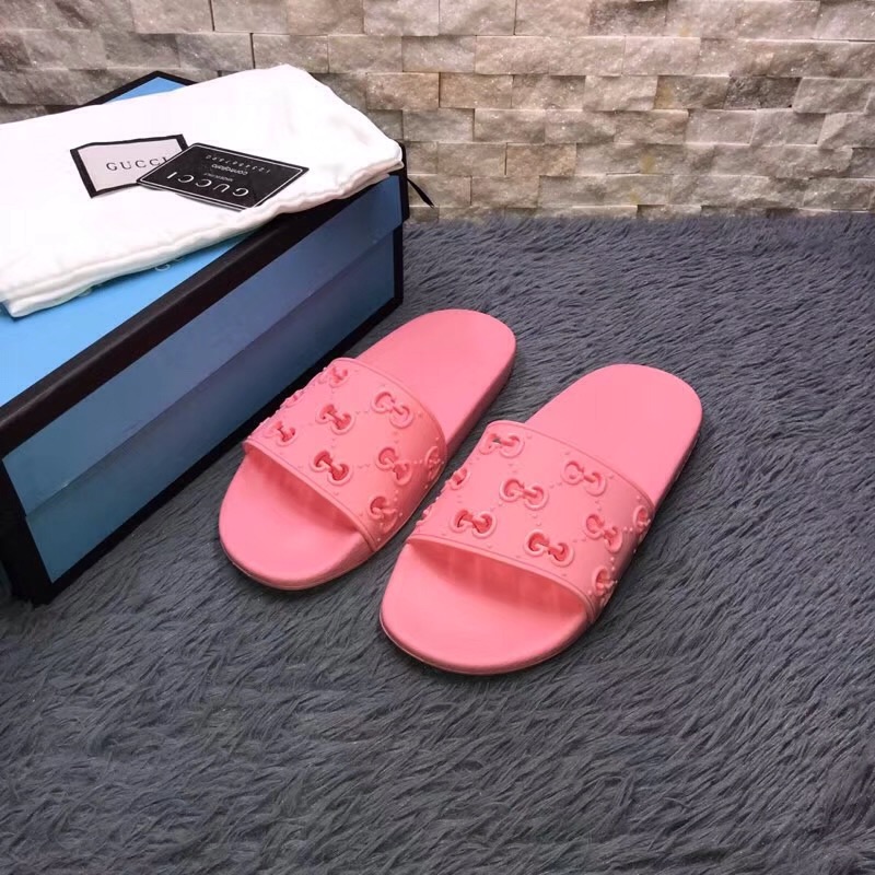 Gucci Rubber GG Slide Sandal In Pink - FashionPlug