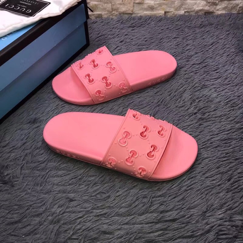 Gucci Rubber GG Slide Sandal In Pink - FashionPlug