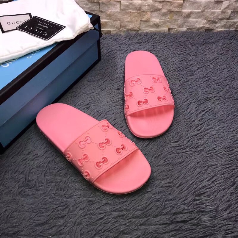 Gucci Rubber GG Slide Sandal In Pink - FashionPlug