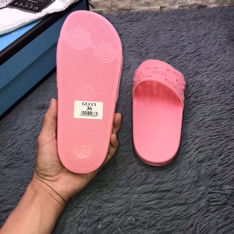 Gucci Rubber GG Slide Sandal In Pink - FashionPlug
