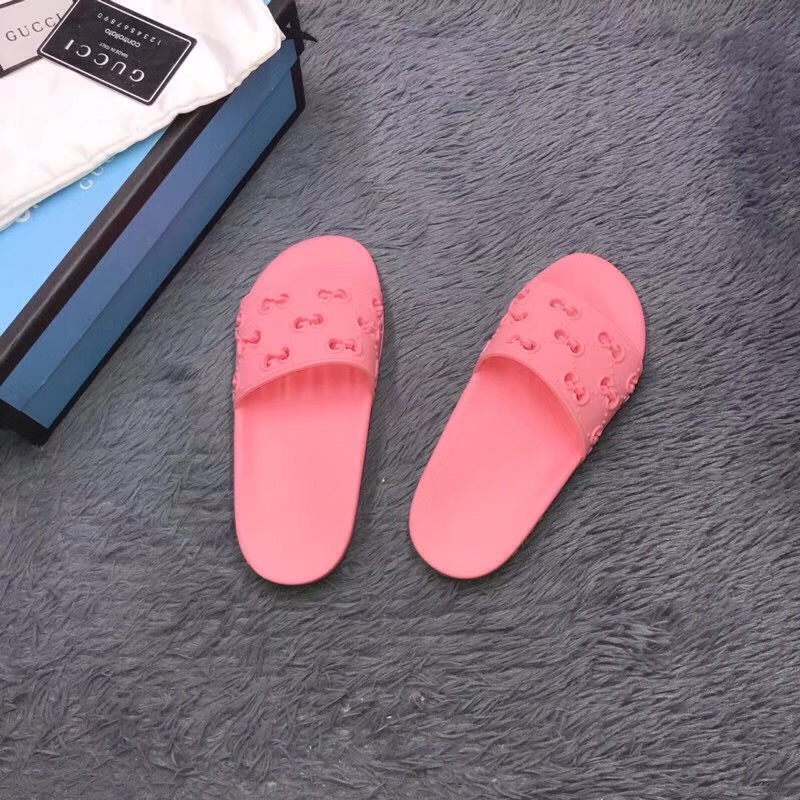 Gucci Rubber GG Slide Sandal In Pink - FashionPlug