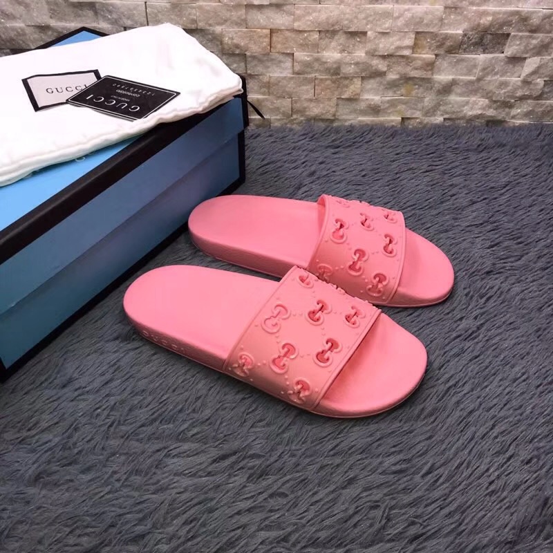 Gucci Rubber GG Slide Sandal In Pink - FashionPlug