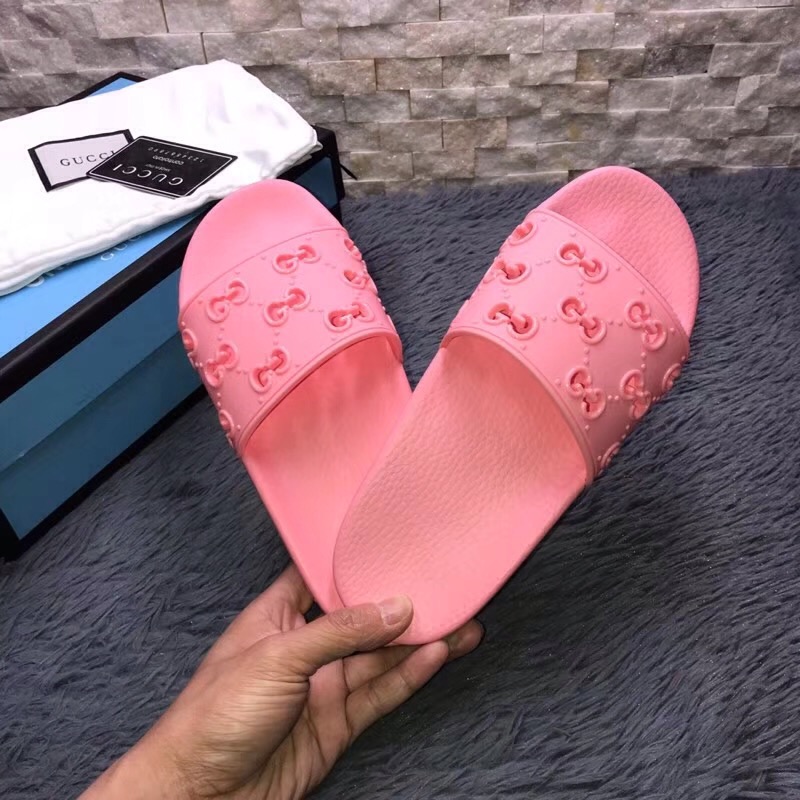 Gucci Rubber GG Slide Sandal In Pink - FashionPlug