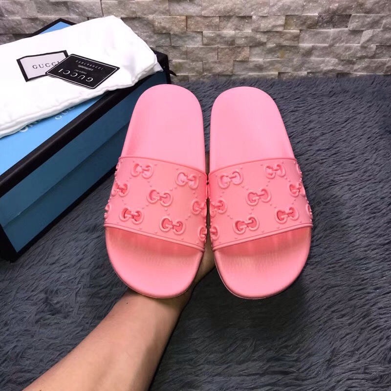 Gucci Rubber GG Slide Sandal In Pink - FashionPlug