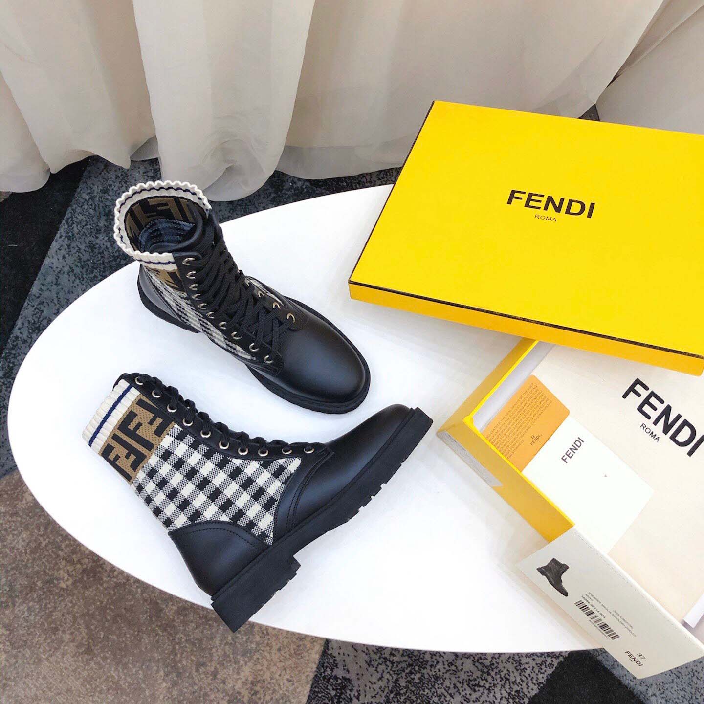 Fendi Leather Biker Boots - FashionPlug