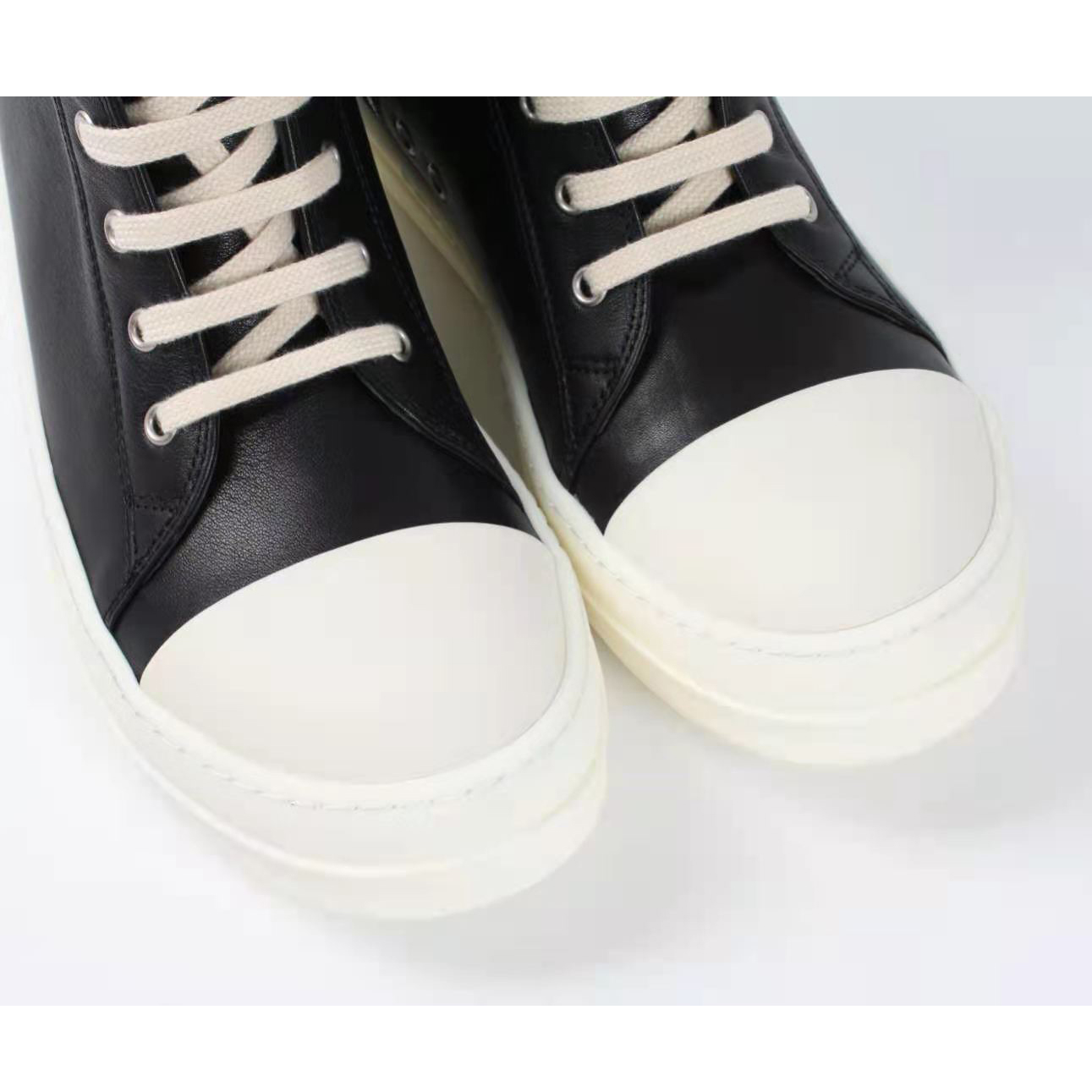 Rick Owens Black Leather High Top Sneakers - FashionPlug