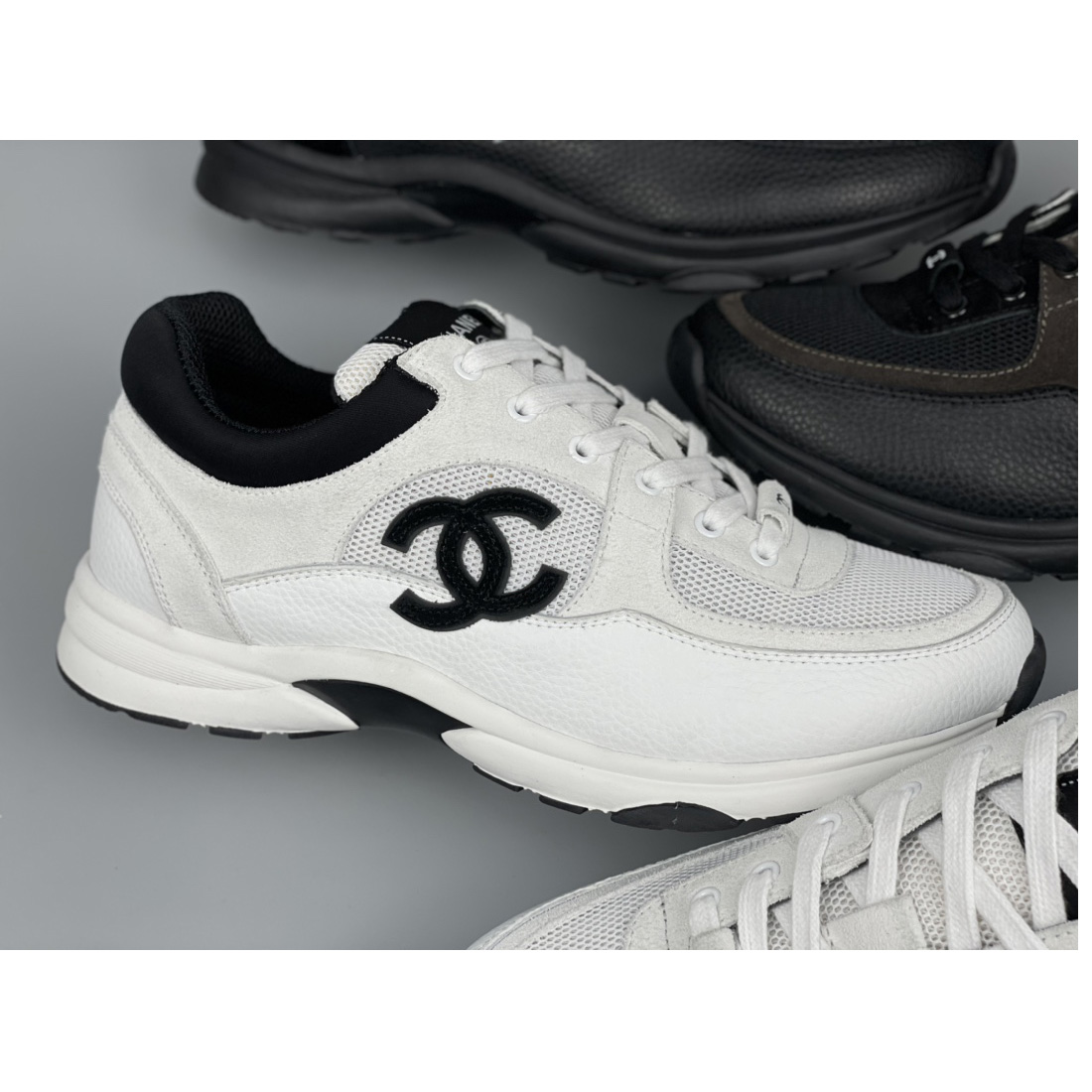 Chanel White Black 22c Leather Calfskin Suede Mesh Cc Logo Trainers Sneakers - FashionPlug