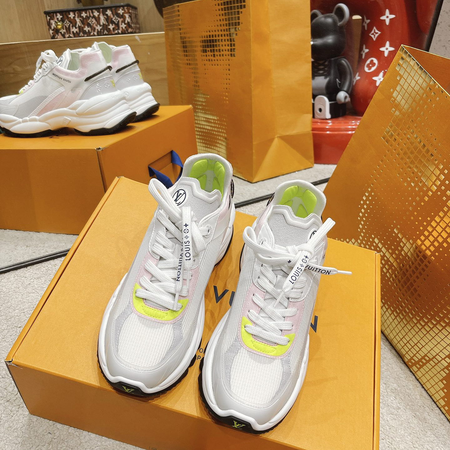 Louis Vuitton Run 55 Sneaker In Grey - FashionPlug