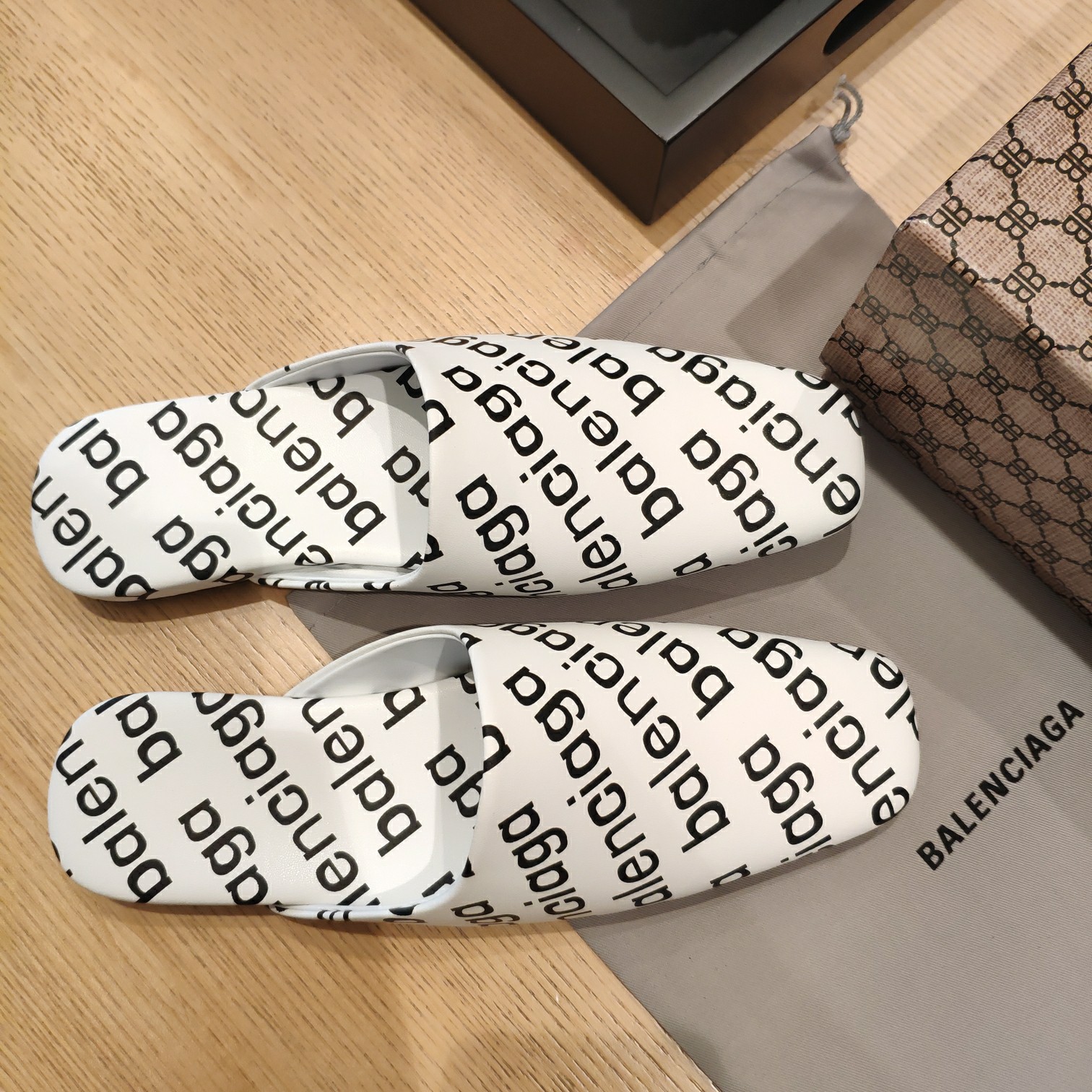 Balenciaga Logo Leather Backless Loafers - FashionPlug