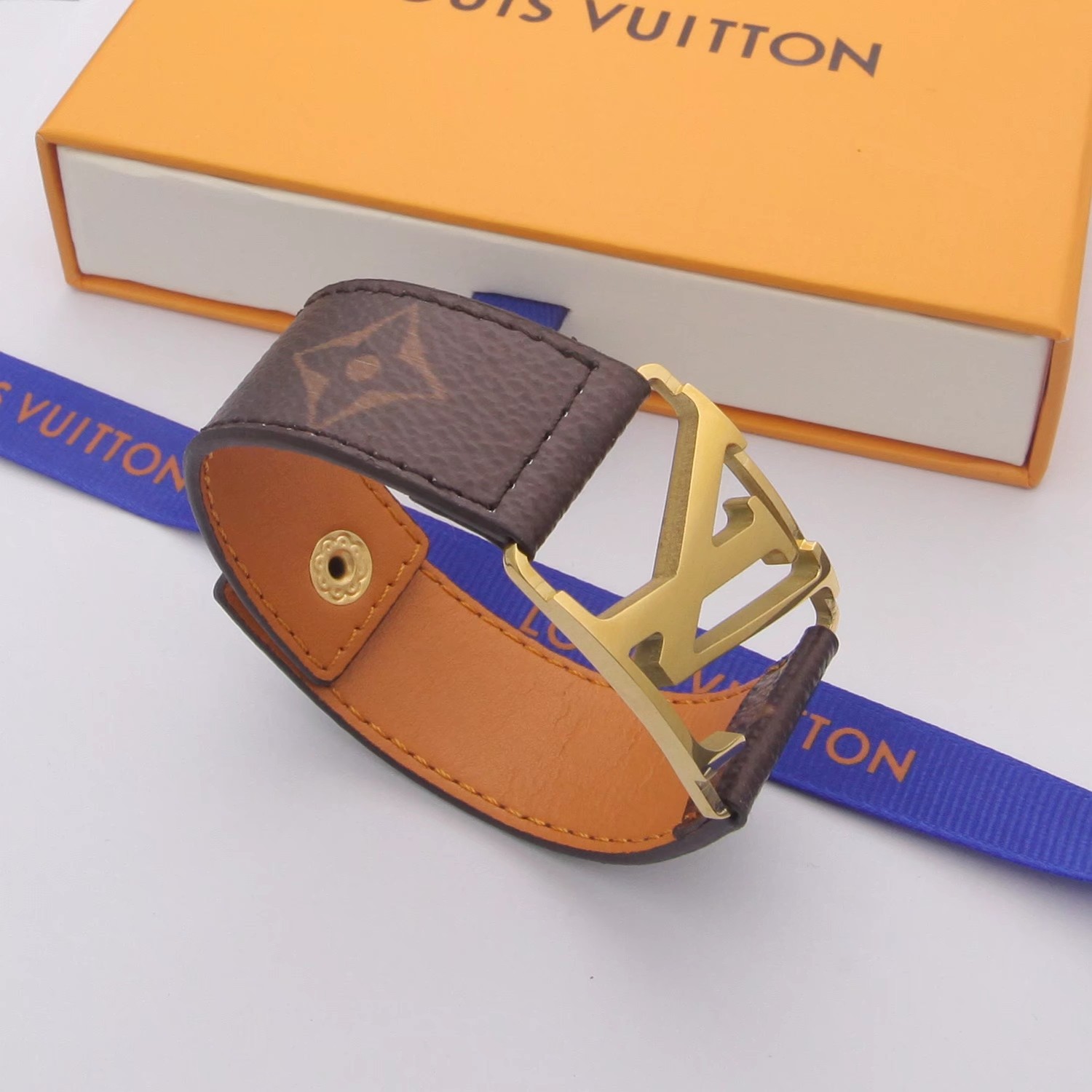 Louis Vuitton Monogram Leather Bracelet - FashionPlug
