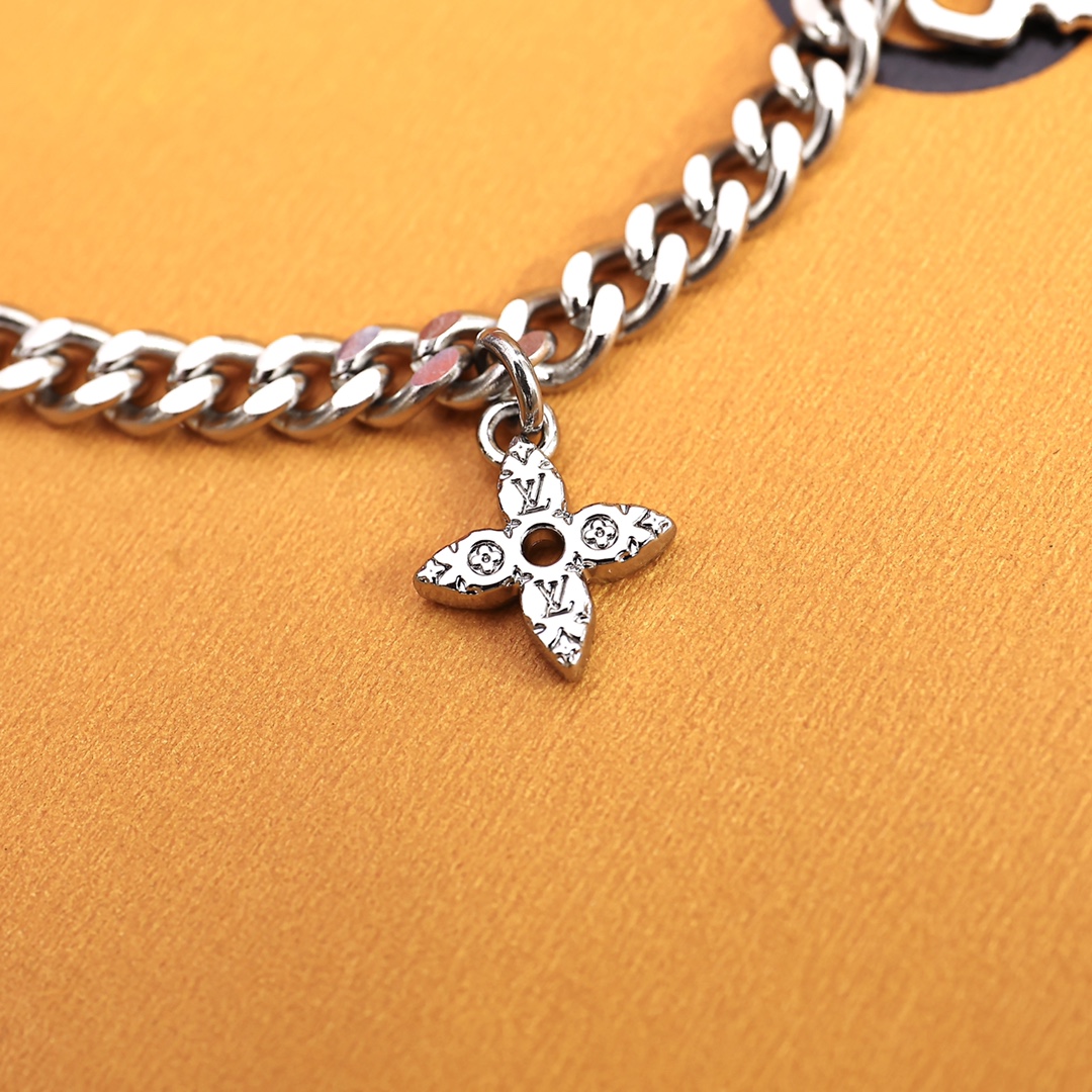 Louis Vuitton Monogram Lock Bracelet - FashionPlug