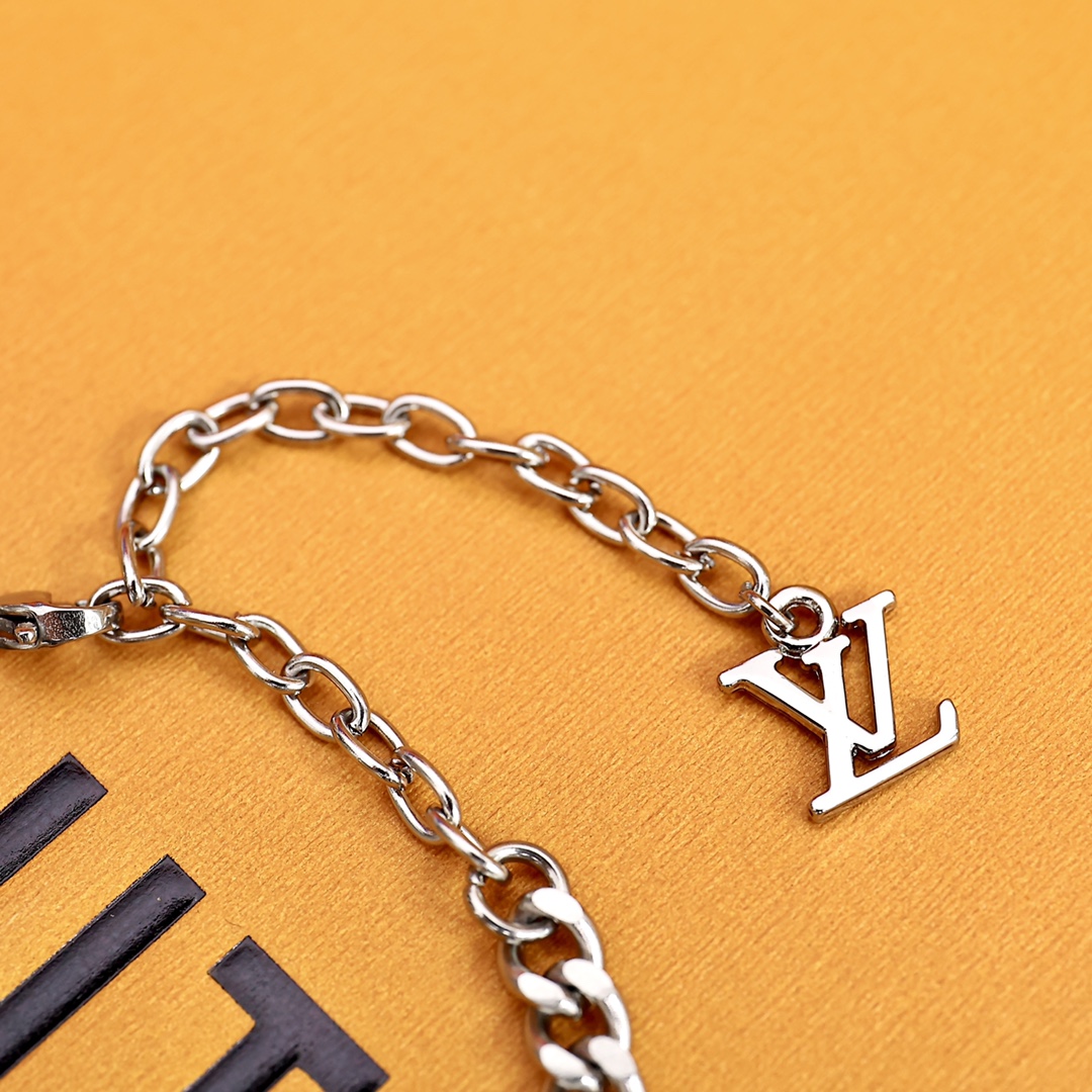 Louis Vuitton Monogram Lock Bracelet - FashionPlug