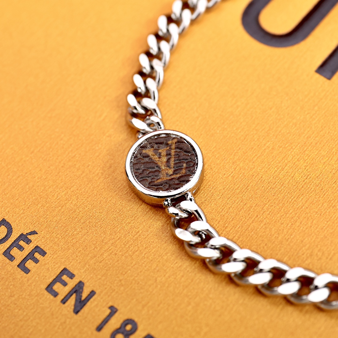Louis Vuitton Monogram Lock Bracelet - FashionPlug