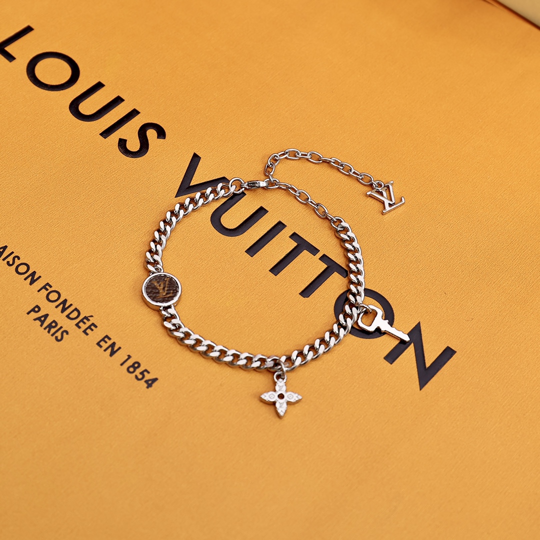 Louis Vuitton Monogram Lock Bracelet - FashionPlug