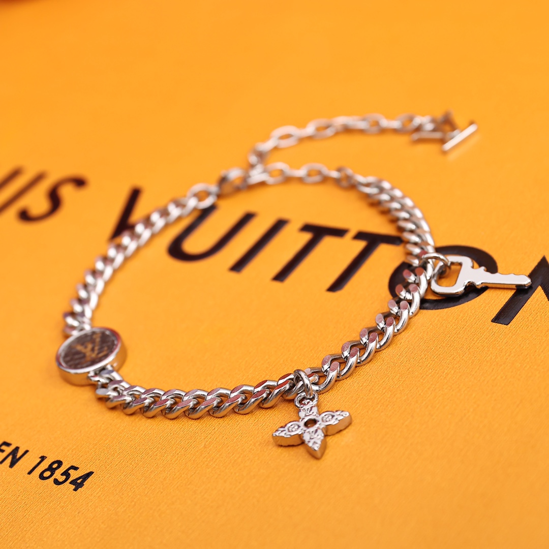 Louis Vuitton Monogram Lock Bracelet - FashionPlug