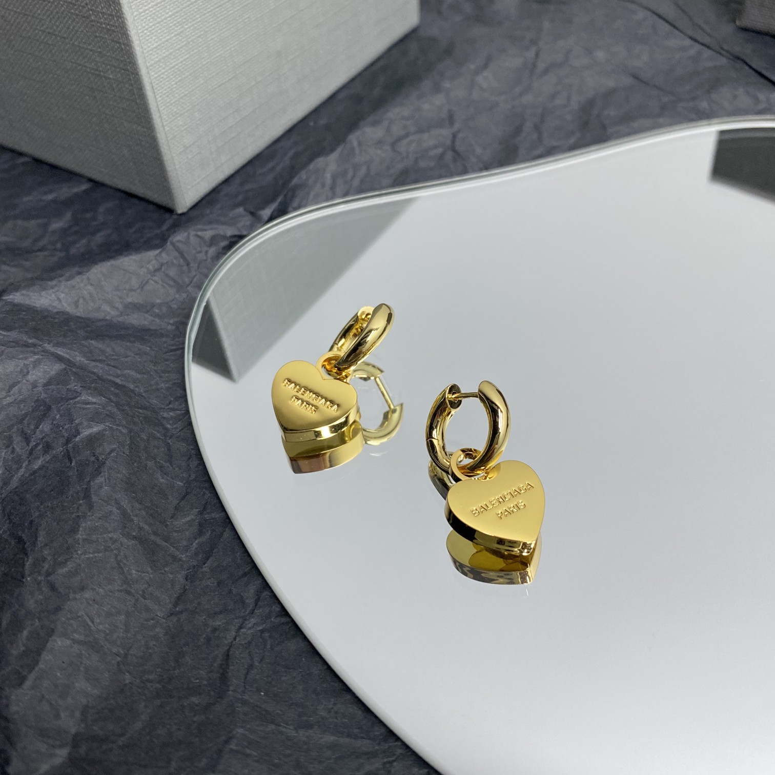 Balenciaga  Engraved Heart Earrings - FashionPlug