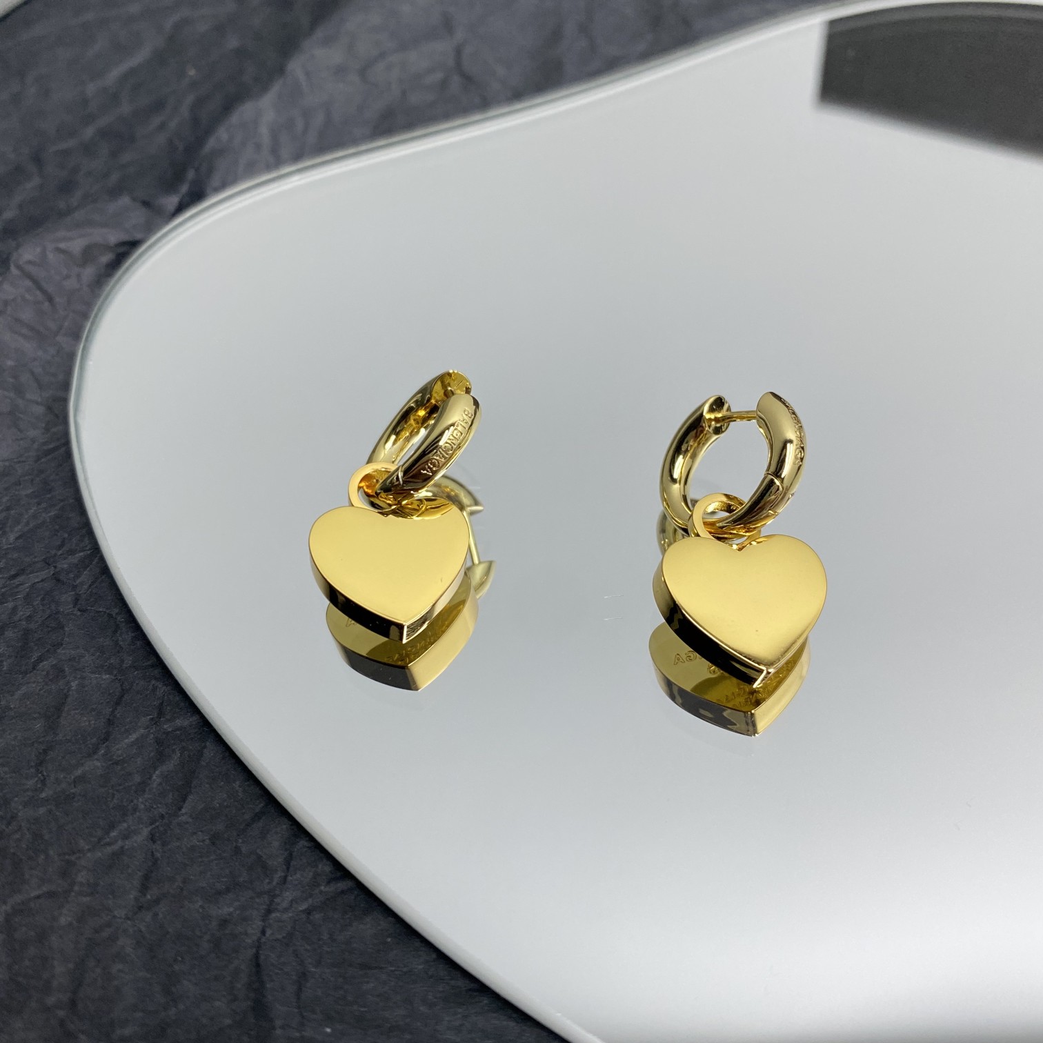 Balenciaga  Engraved Heart Earrings - FashionPlug