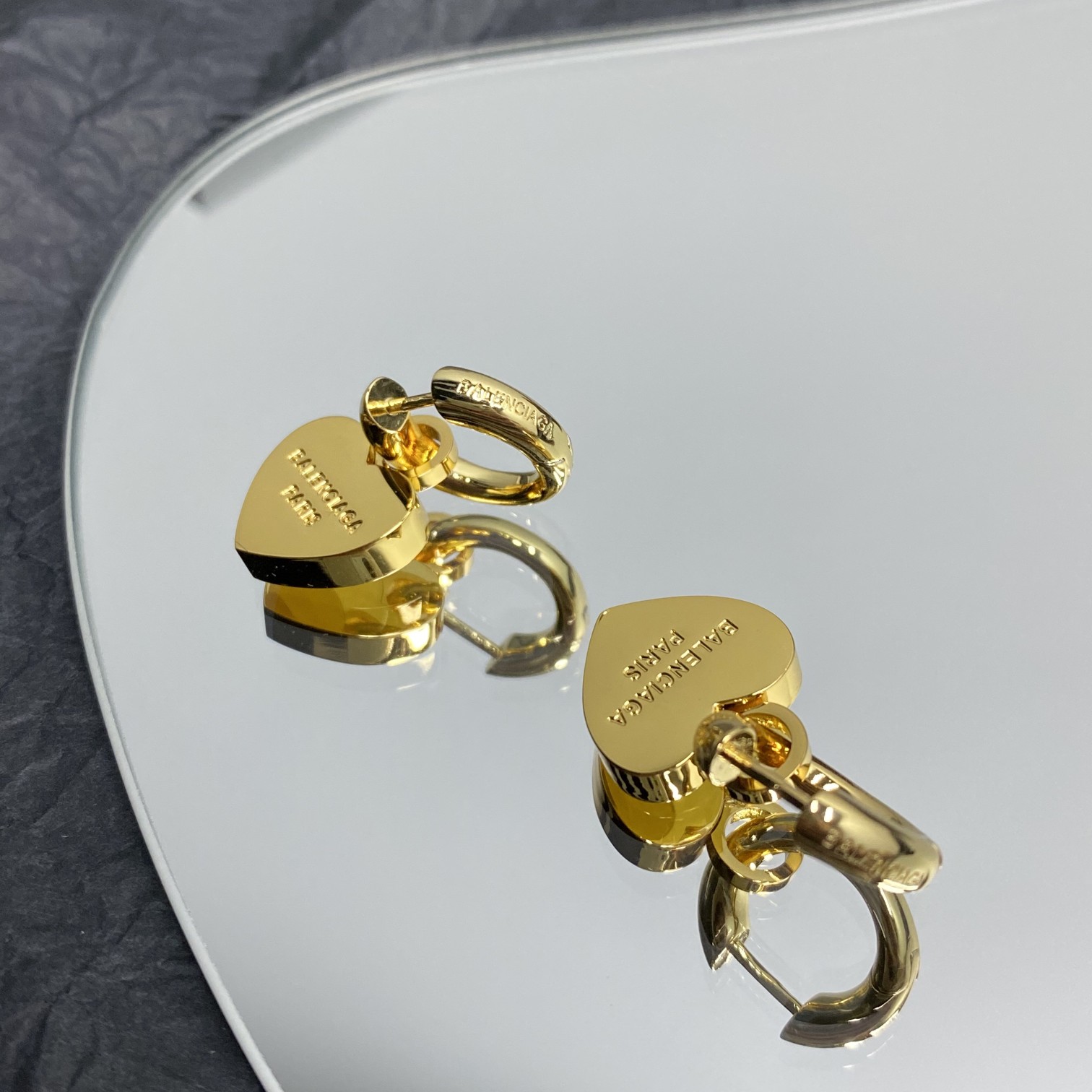 Balenciaga  Engraved Heart Earrings - FashionPlug