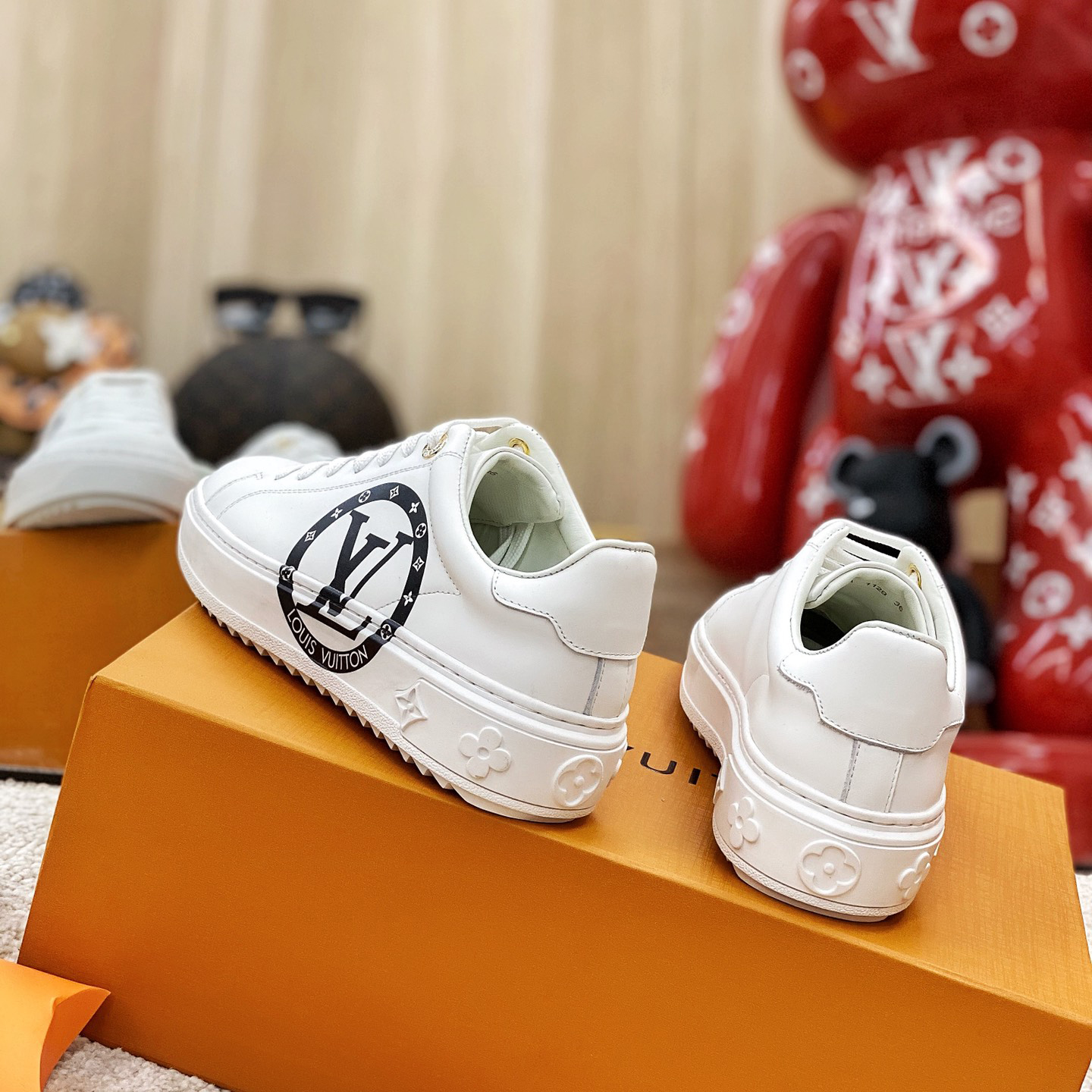 Louis Vuitton Time Out Sneaker - FashionPlug