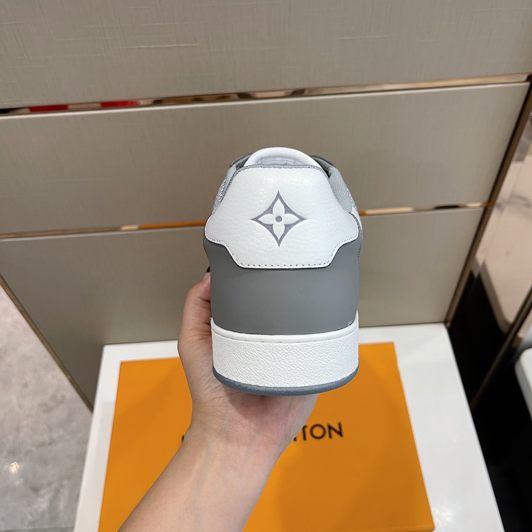 Louis Vuitton Men's Rivoli Sneaker - FashionPlug
