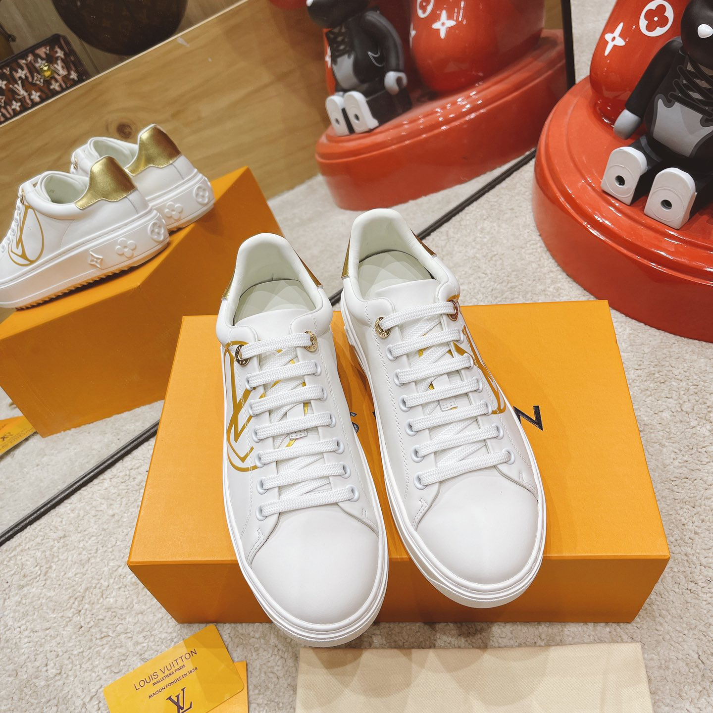 Louis Vuitton Time Out Sneaker  - FashionPlug