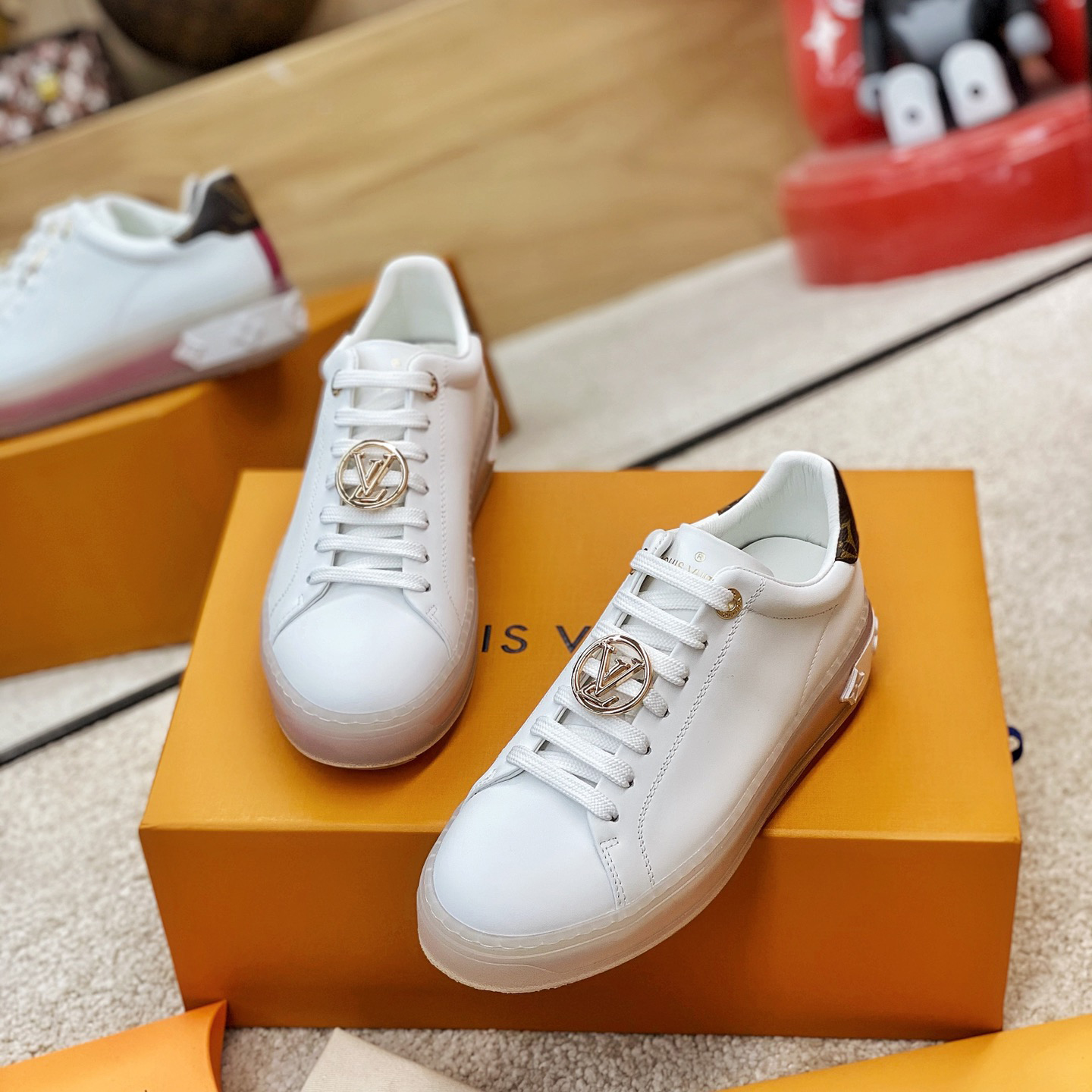 Louis Vuitton Logo Transparent Sole Sneaker  - FashionPlug