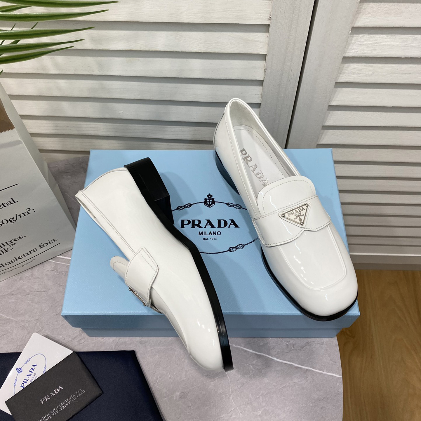 Prada Chocolate Brushed Leather Loafers - FashionPlug