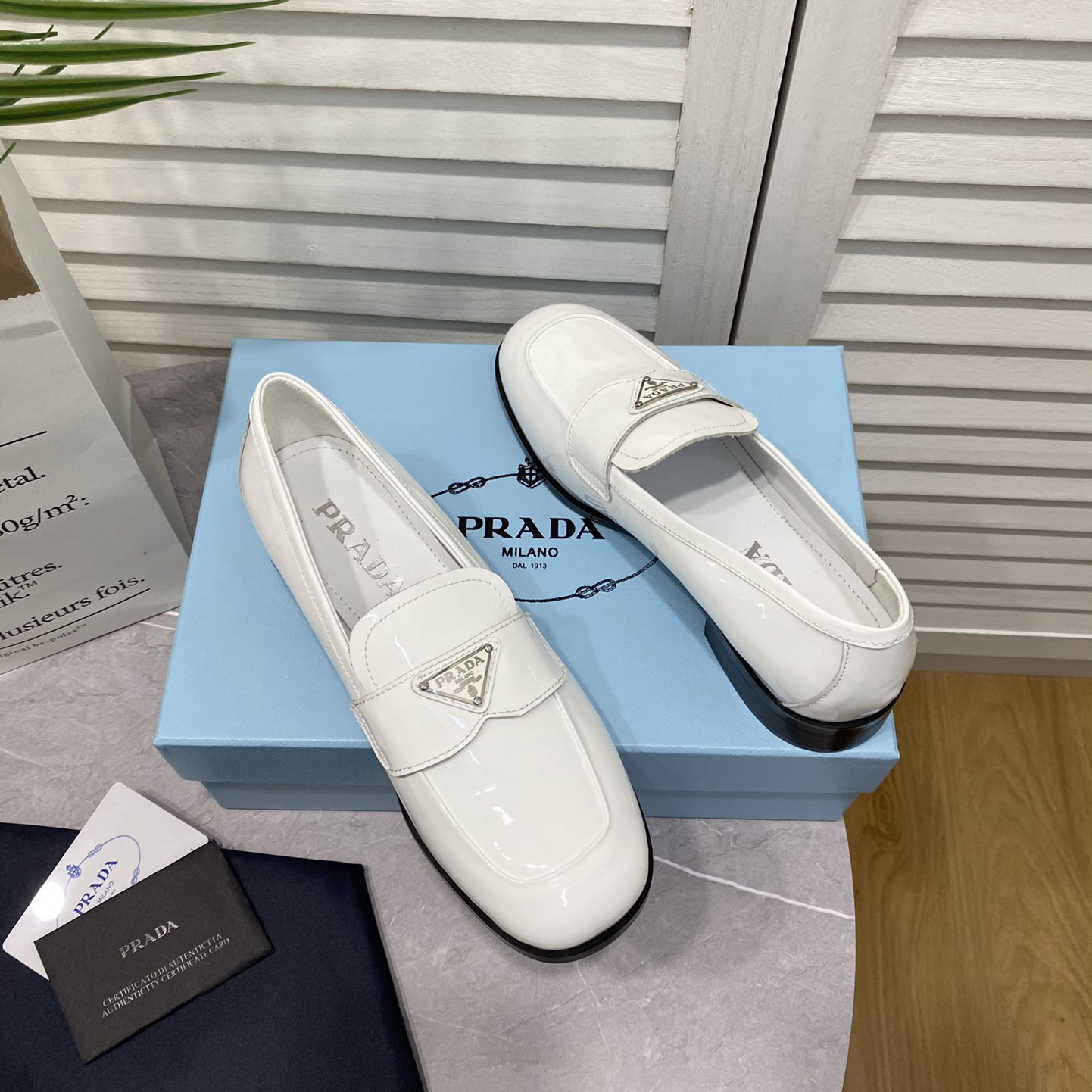 Prada Chocolate Brushed Leather Loafers - FashionPlug