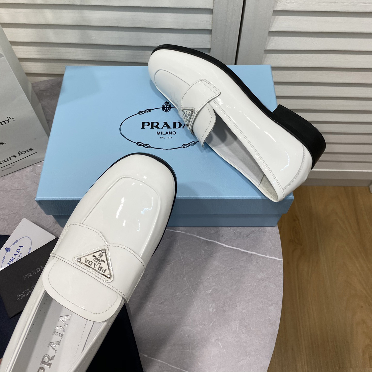 Prada Chocolate Brushed Leather Loafers - FashionPlug