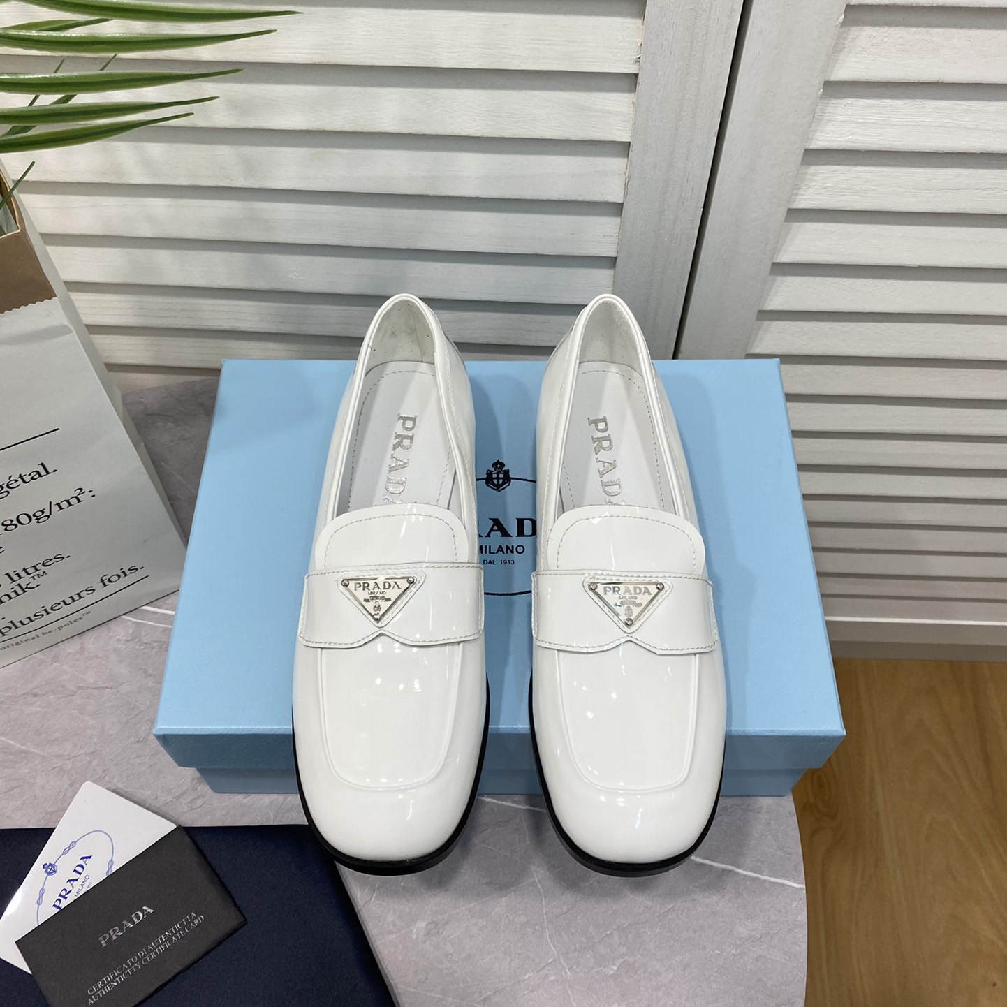 Prada Chocolate Brushed Leather Loafers - FashionPlug