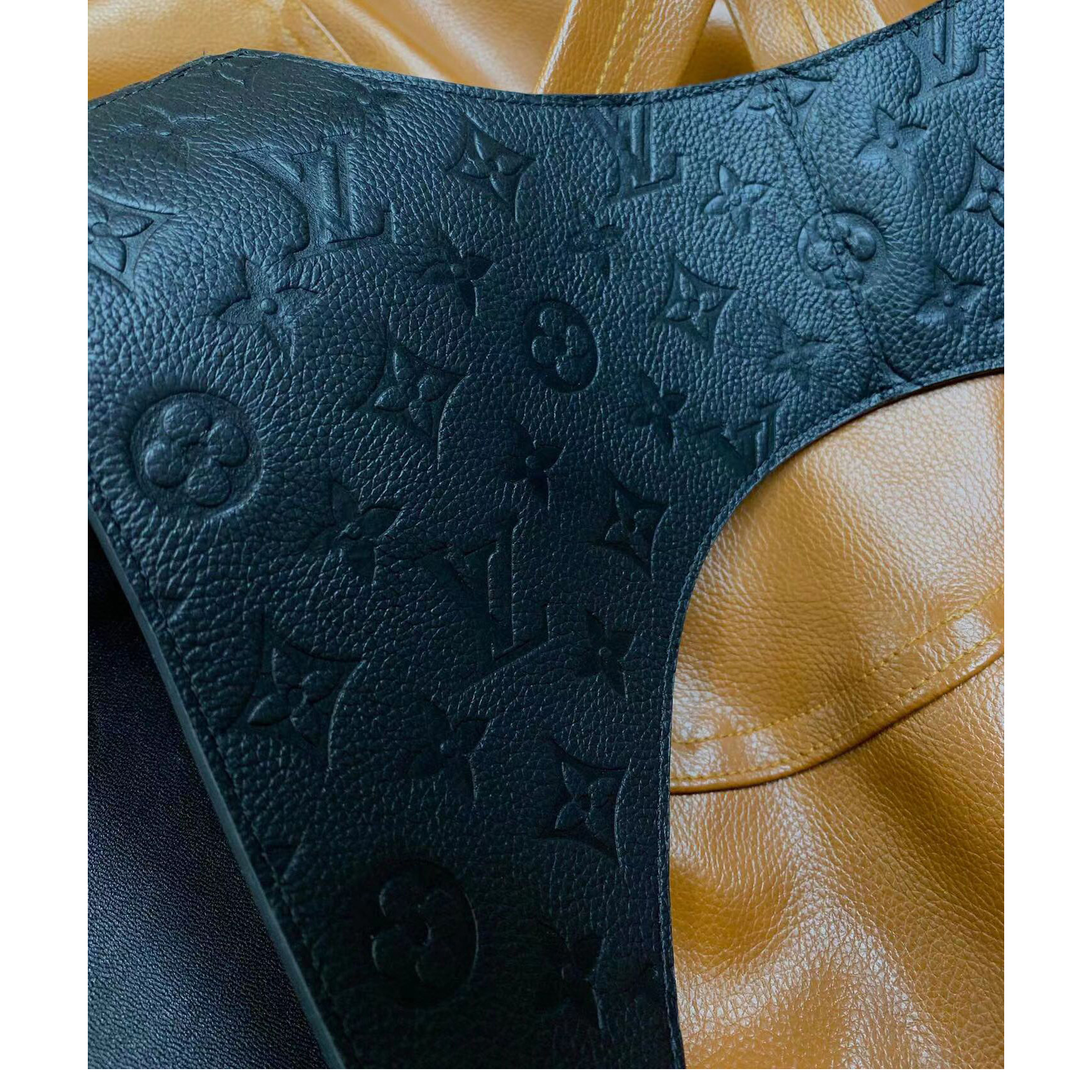 Louis Vuitton Black Monogram Embossed Leather Mid Layer  - FashionPlug