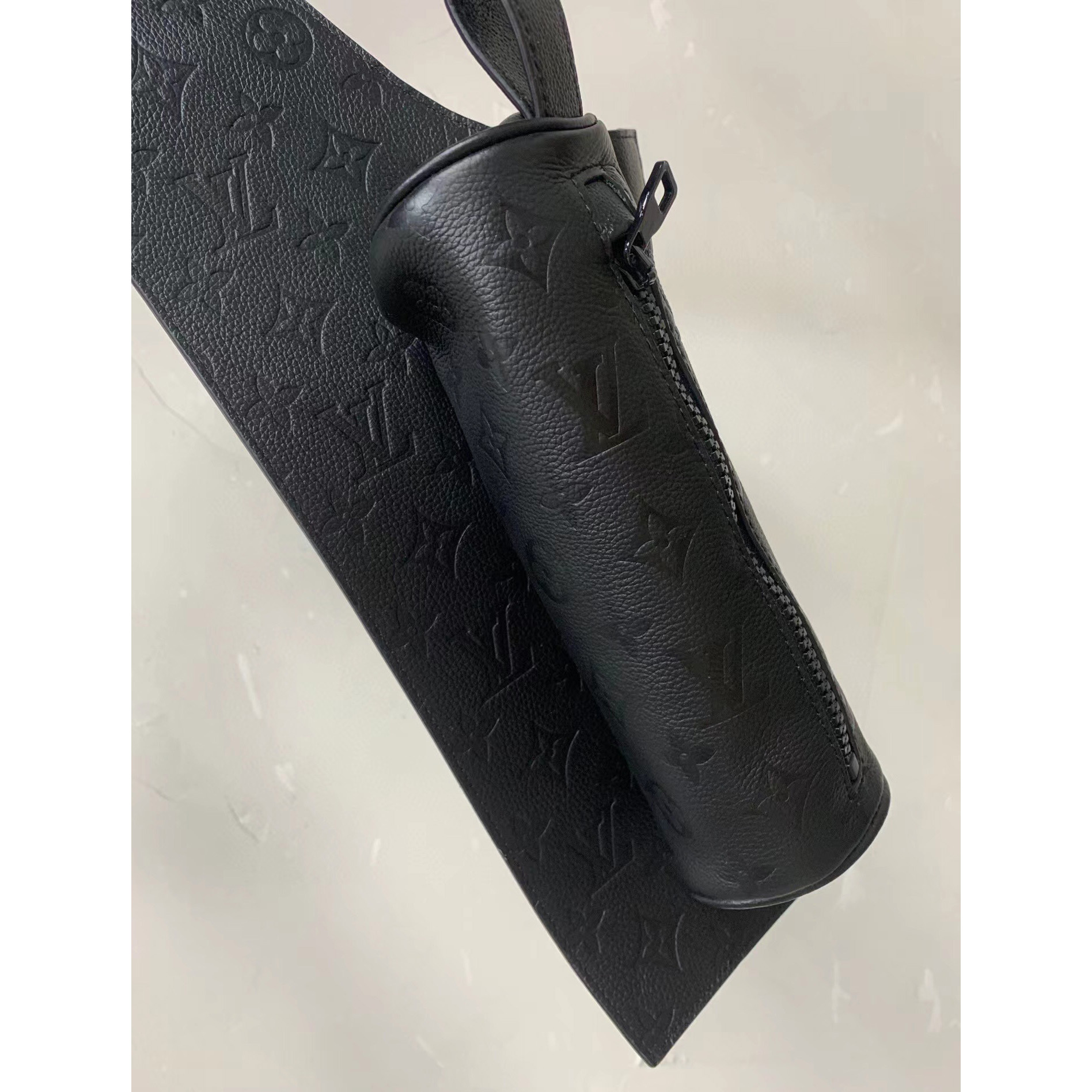 Louis Vuitton Black Monogram Embossed Leather Mid Layer  - FashionPlug