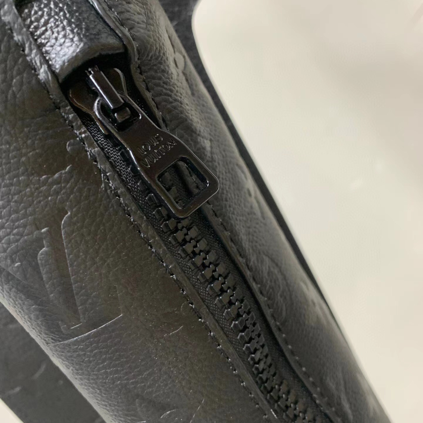 Louis Vuitton Black Monogram Embossed Leather Mid Layer  - FashionPlug