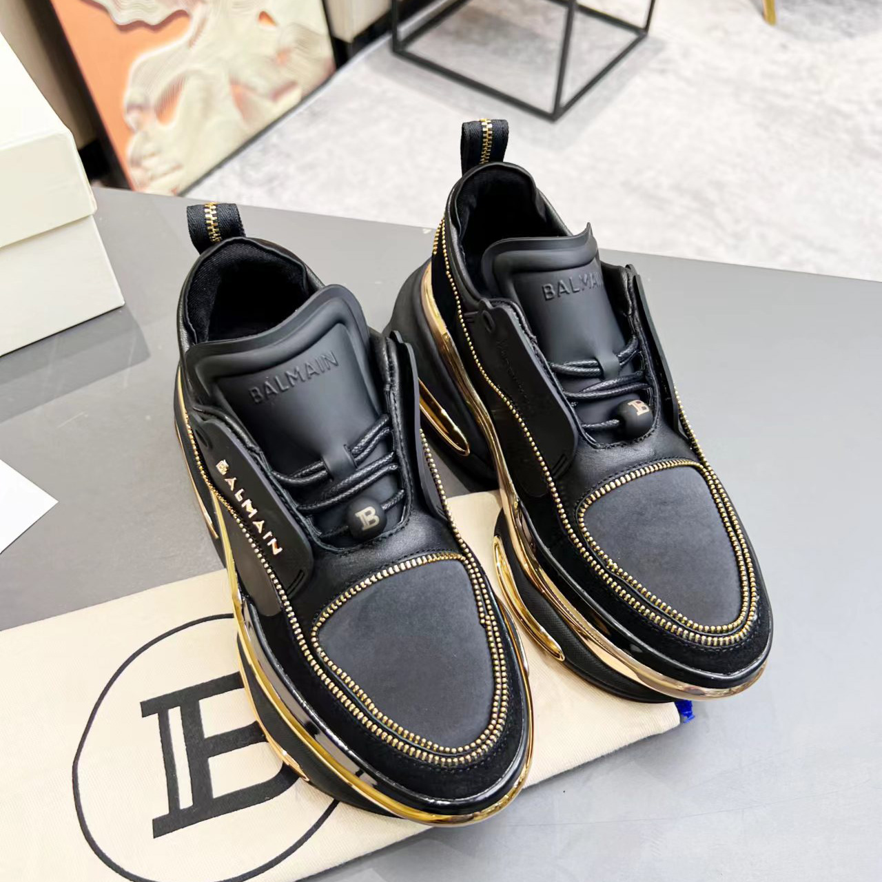 Balmain Leather And Suede B-Bold Low-Top Sneakers - FashionPlug