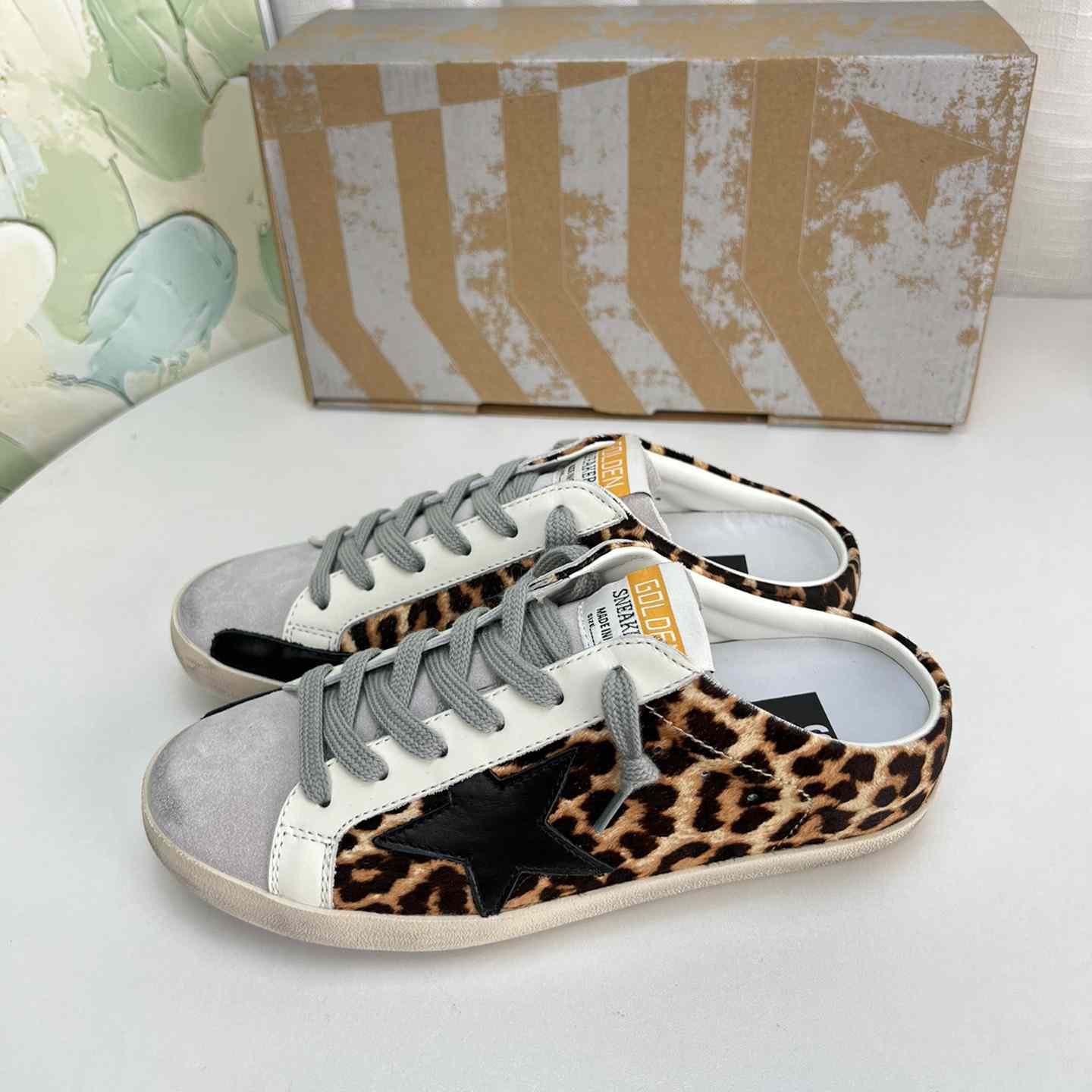 Golden Goose Super-Star Sabots In Leopard-Print Pony Skin With Black Leather Star And Ice-Gray Suede Tongue - FashionPlug
