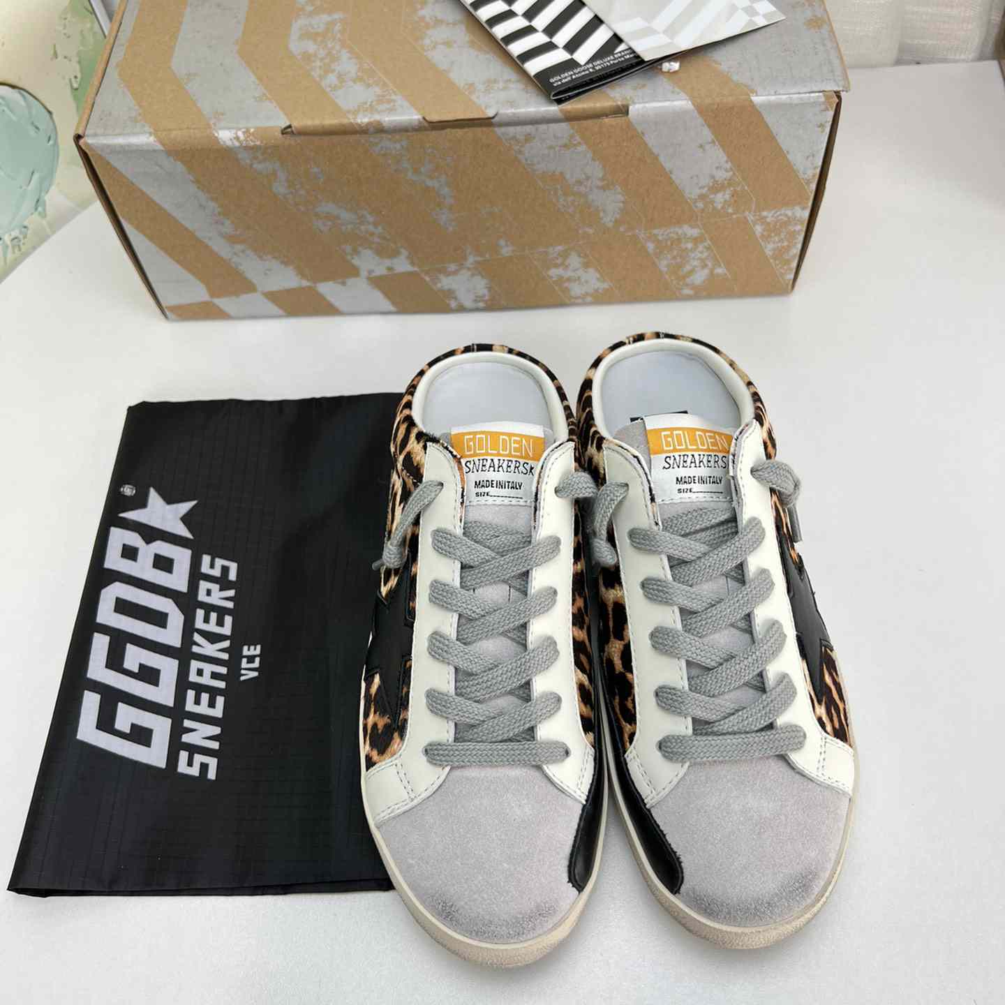 Golden Goose Super-Star Sabots In Leopard-Print Pony Skin With Black Leather Star And Ice-Gray Suede Tongue - FashionPlug