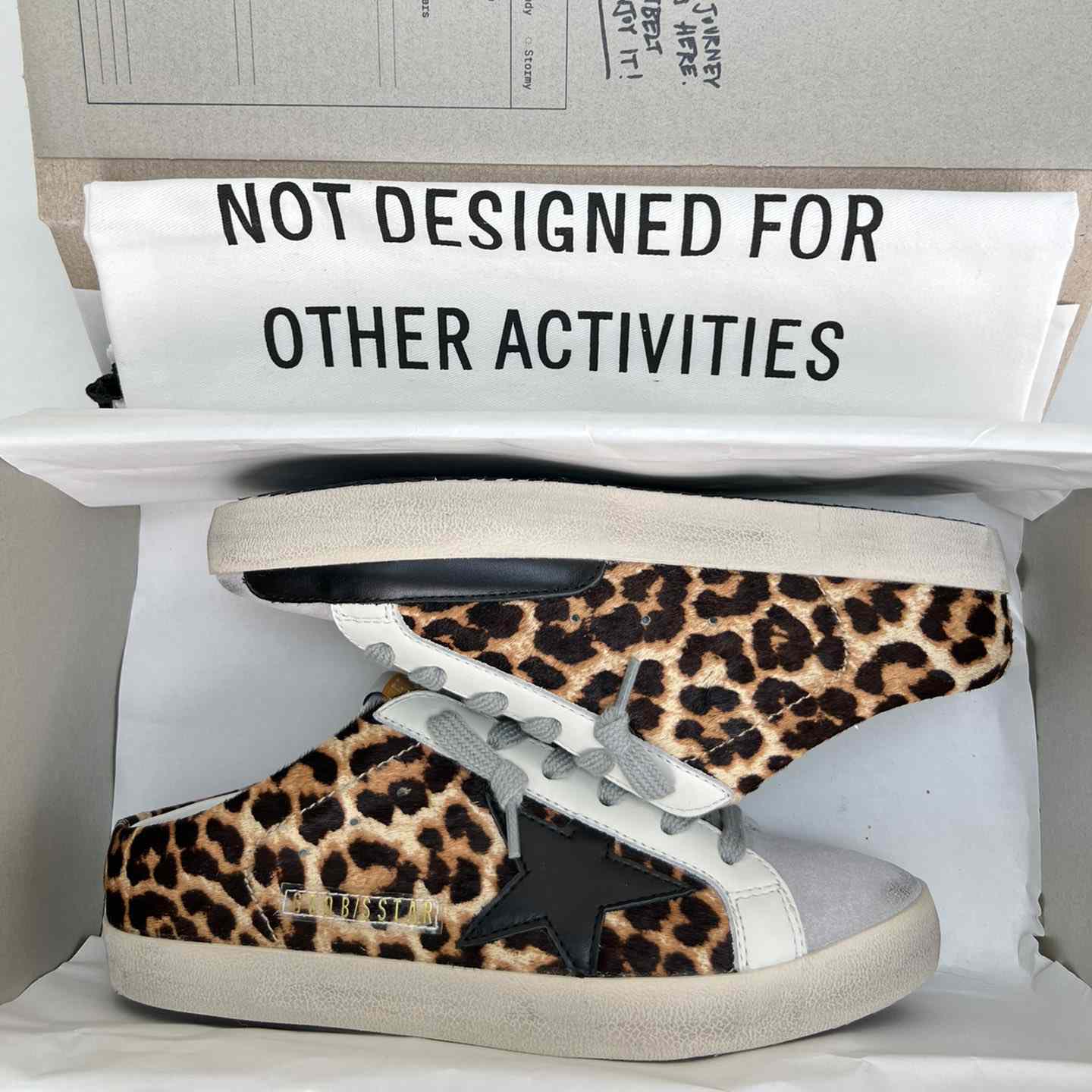 Golden Goose Super-Star Sabots In Leopard-Print Pony Skin With Black Leather Star And Ice-Gray Suede Tongue - FashionPlug