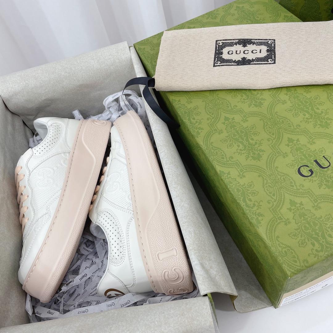 Gucci GG Embossed Sneaker - FashionPlug