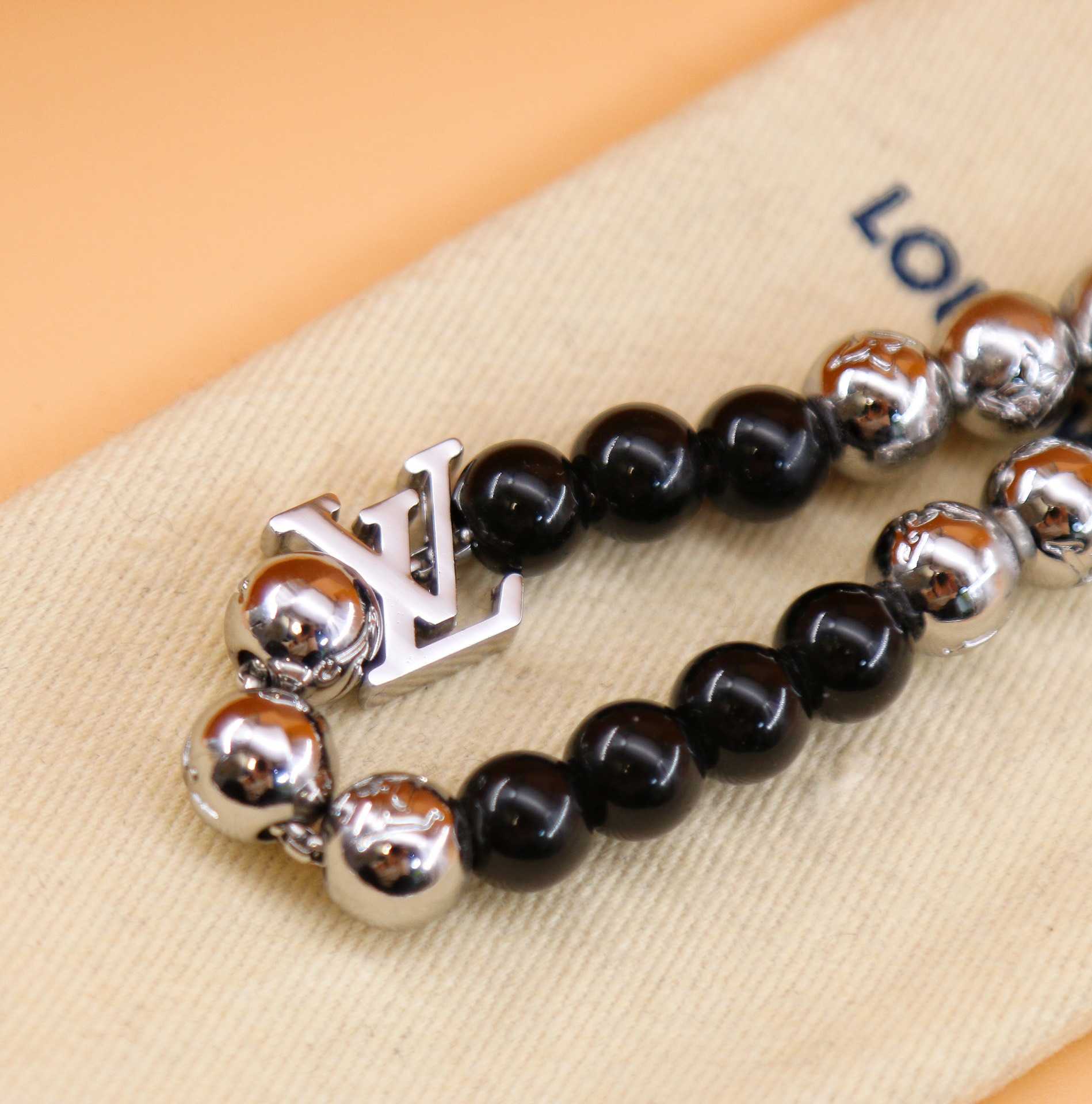 Louis Vuitton Monogram Beads Bracelet   M00512 - FashionPlug