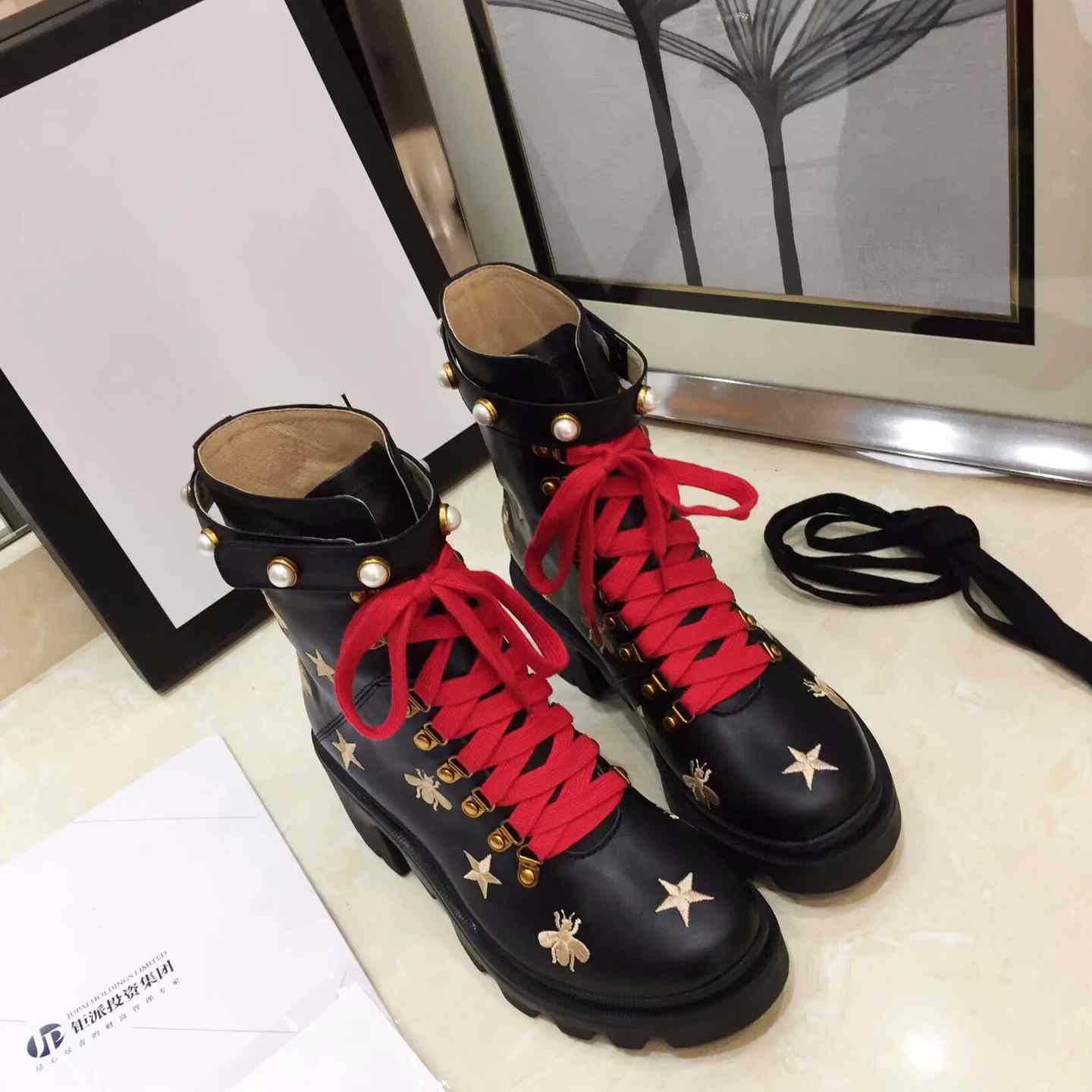 Gucci Leather Ankle Boot - FashionPlug