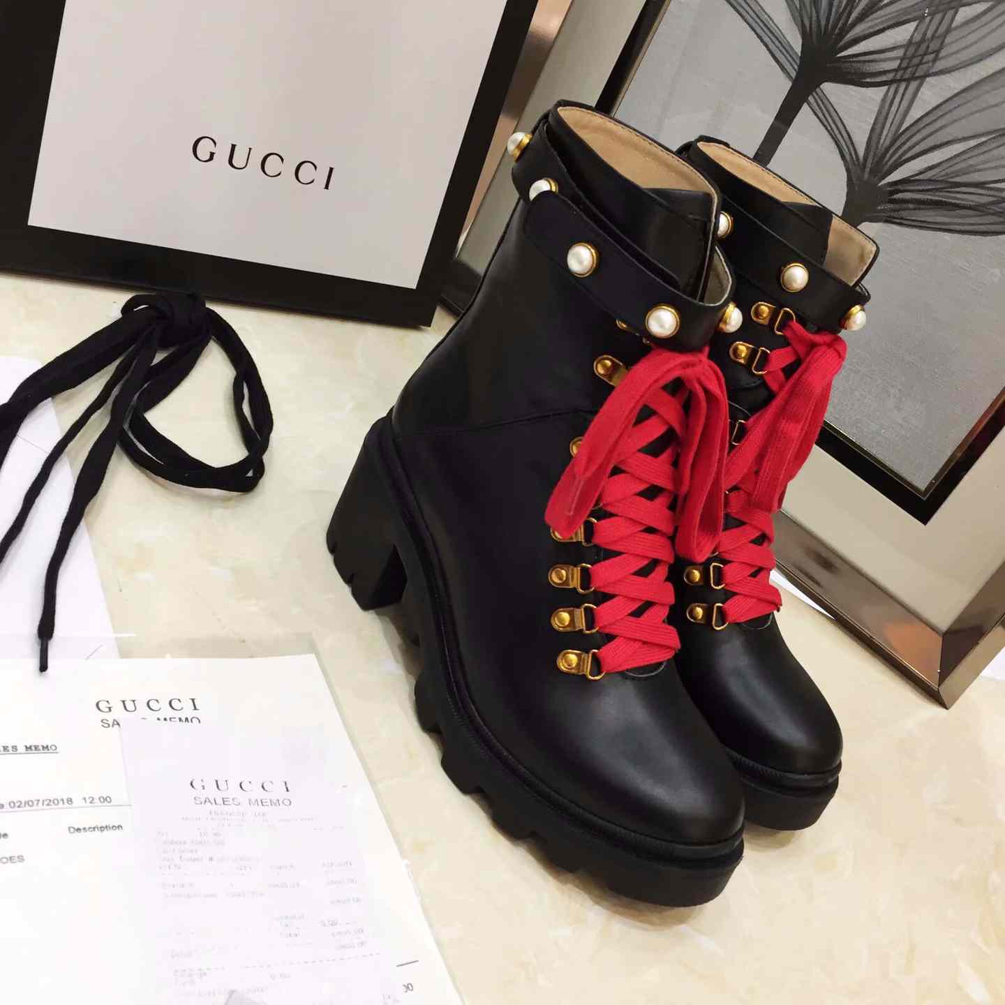 Gucci Leather Ankle Boot - FashionPlug