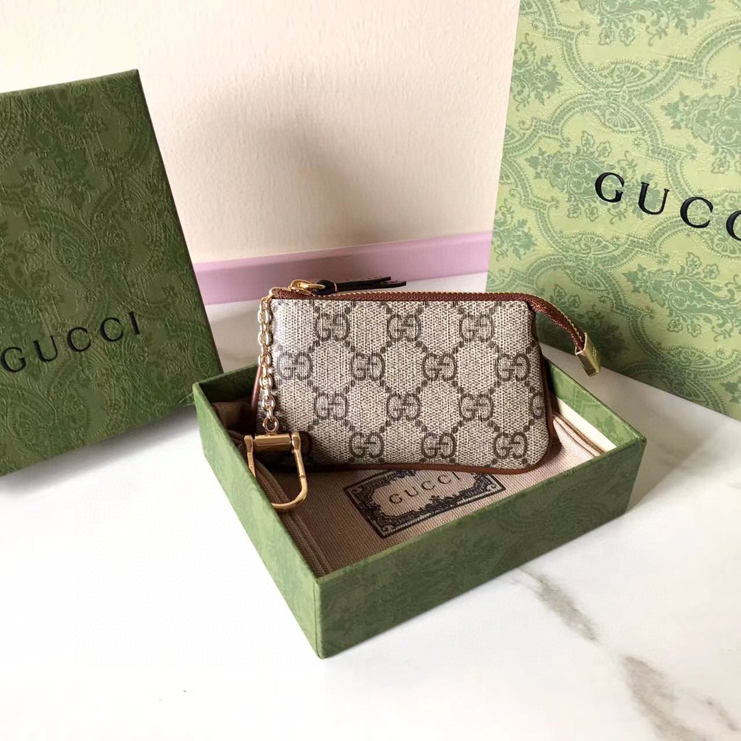 Gucci GG Supreme Key Pouch - FashionPlug