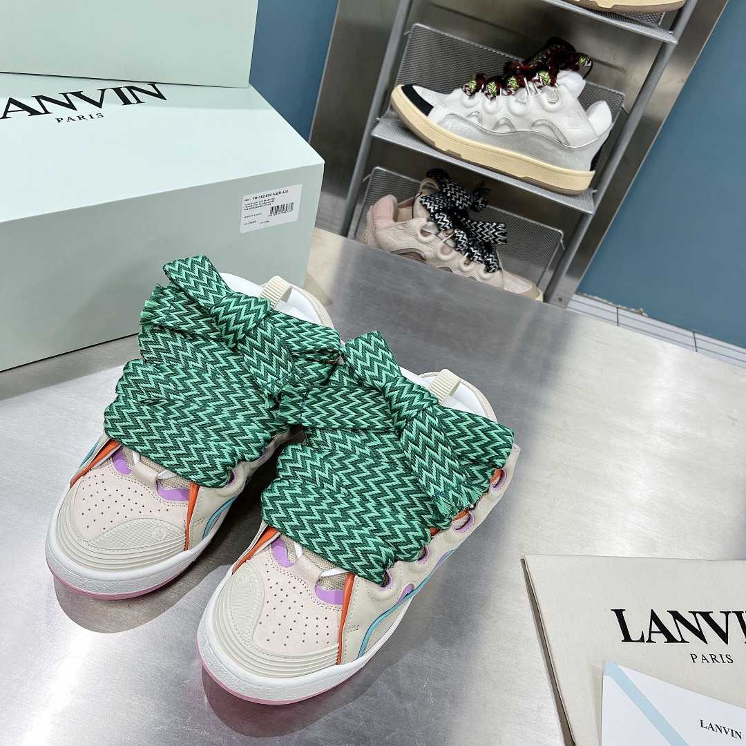Lanvin Leather Curb Sneakers - FashionPlug
