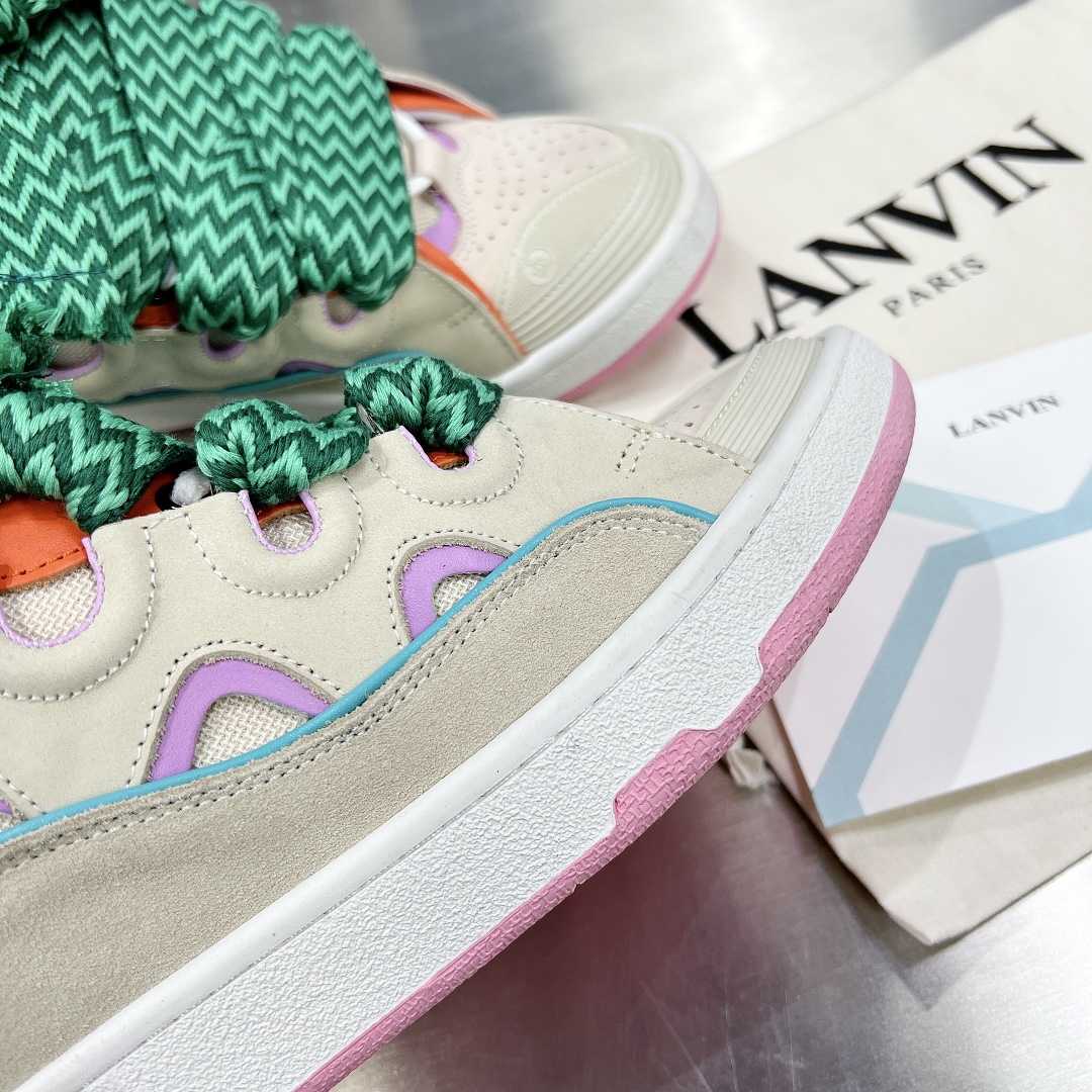 Lanvin Leather Curb Sneakers - FashionPlug