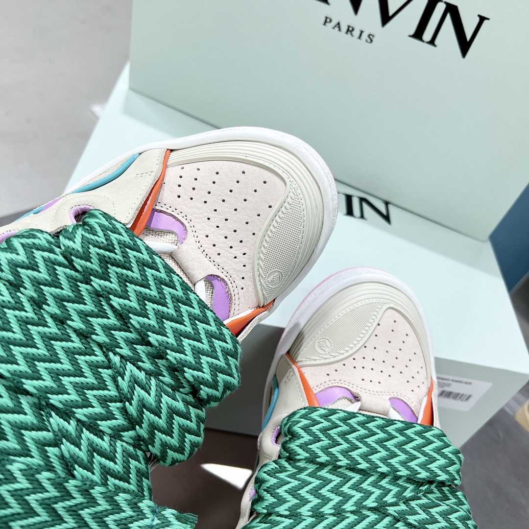 Lanvin Leather Curb Sneakers - FashionPlug
