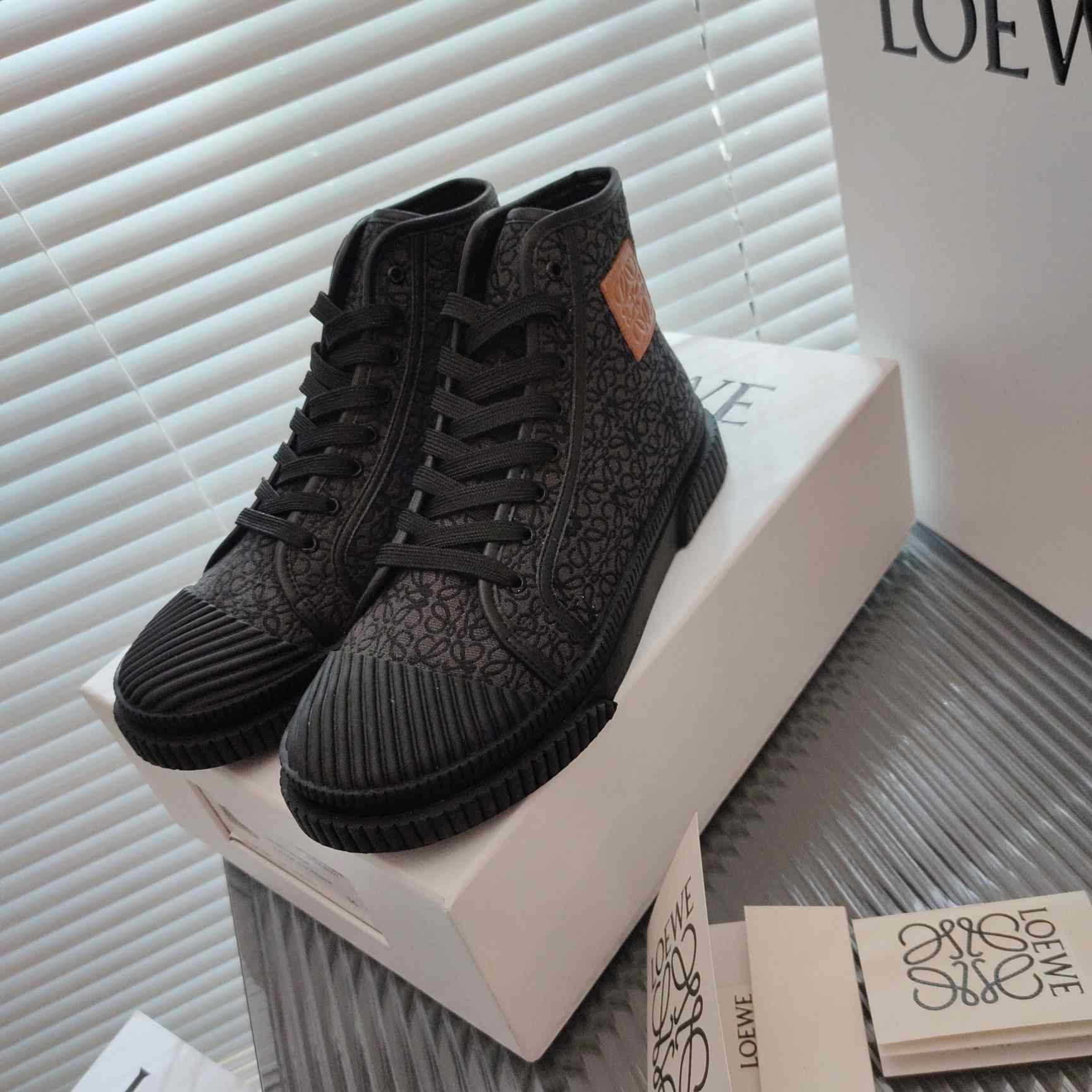 Loewe Anagram High Top Sneaker In Canvas - FashionPlug