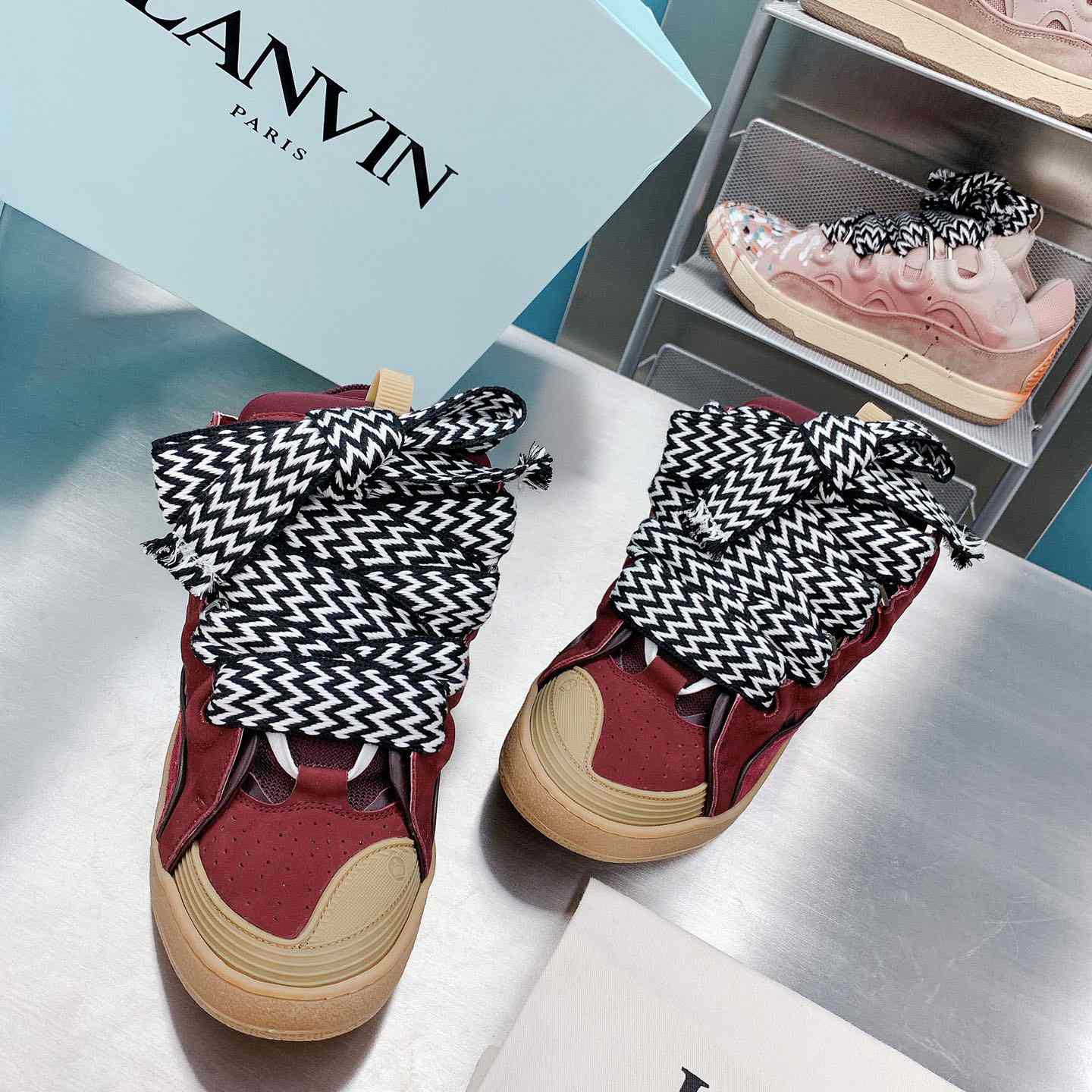 Lanvin Leather Curb Sneakers - FashionPlug