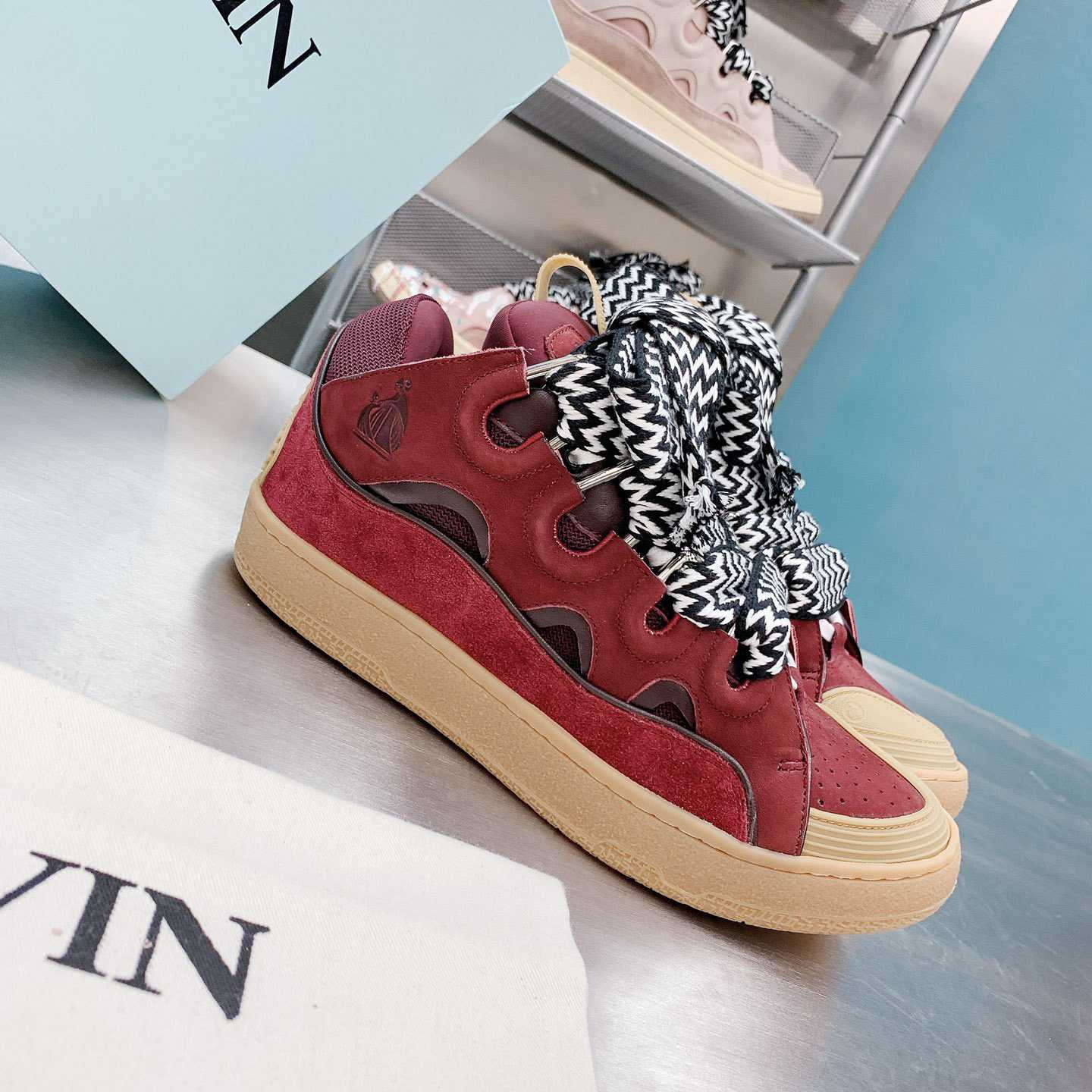 Lanvin Leather Curb Sneakers - FashionPlug