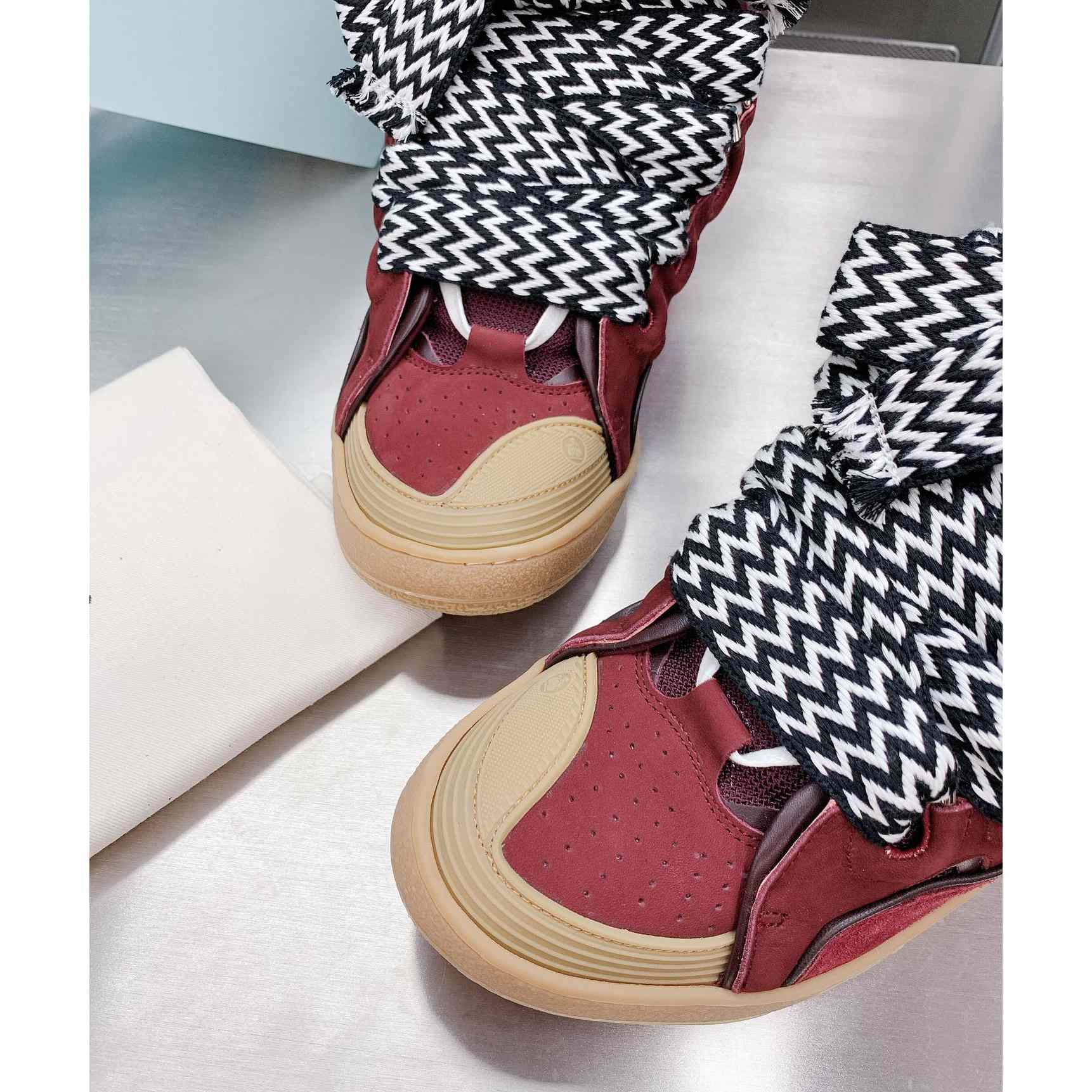 Lanvin Leather Curb Sneakers - FashionPlug
